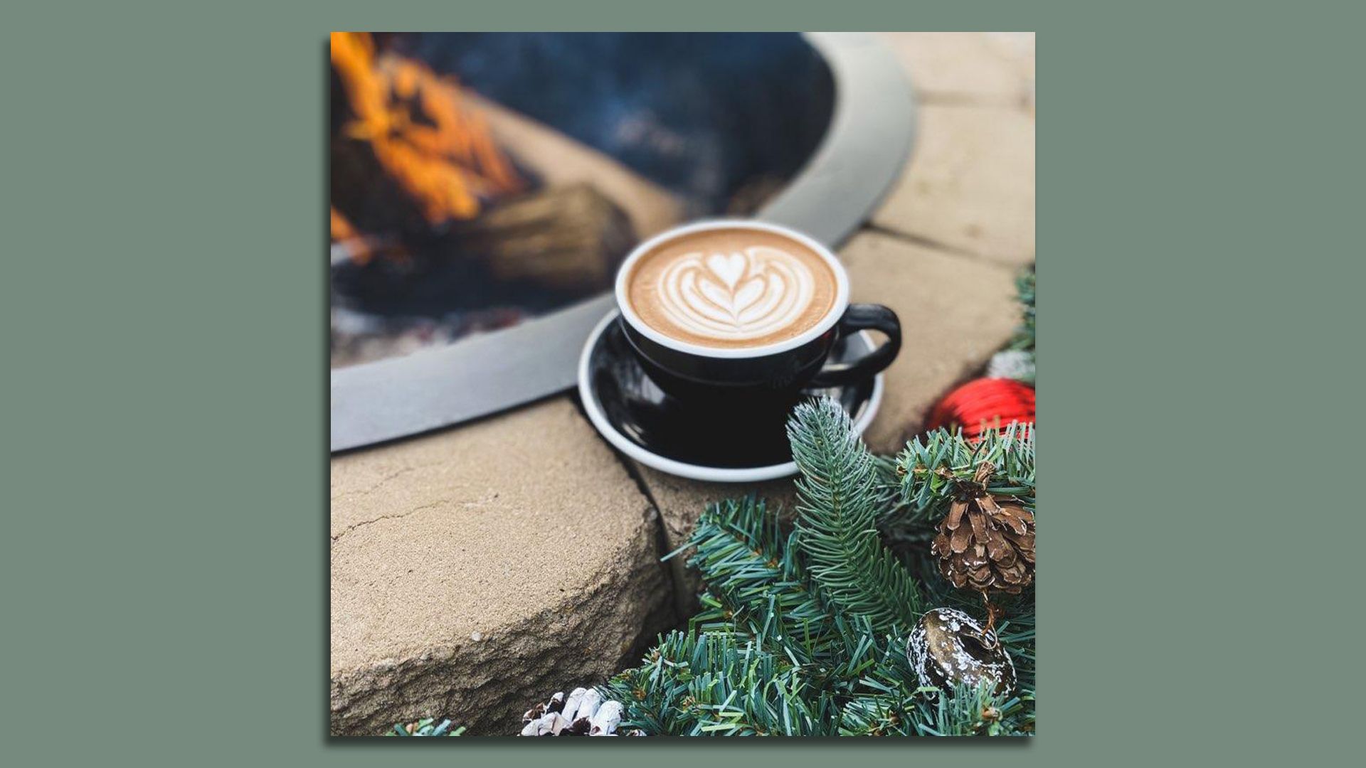 coffee latte art next to a fire