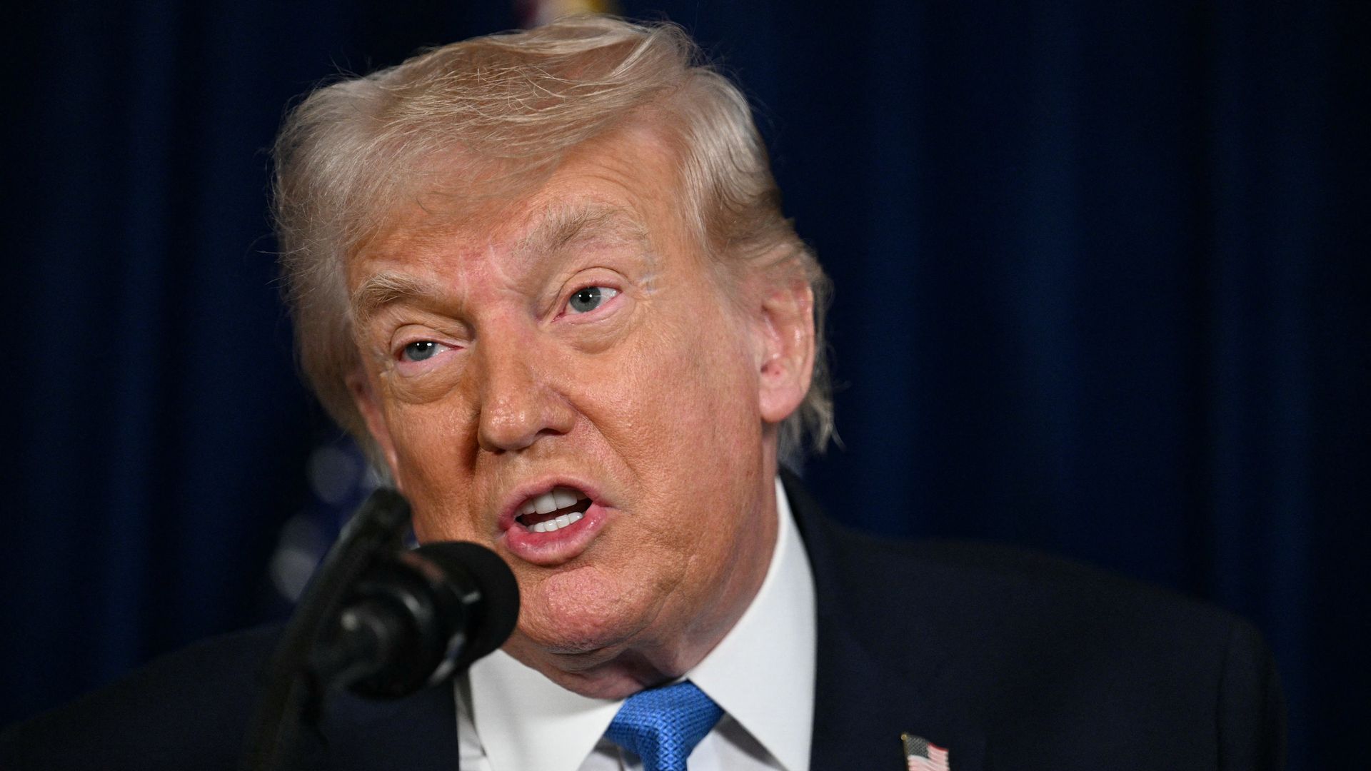 President Donald Trump speaks to reporters at Mar-a-Lago in Palm Beach, Florida.