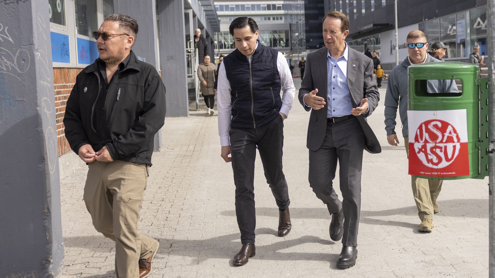 Louisiana Governor Jeff Landry and Greenlandic mason and Trump supporter Joergen Boassen are pictured in Nuuk, Greenland on the sidelines of the Future Greenland business fair. The poster on the trash can reads "USA" and "ASU."