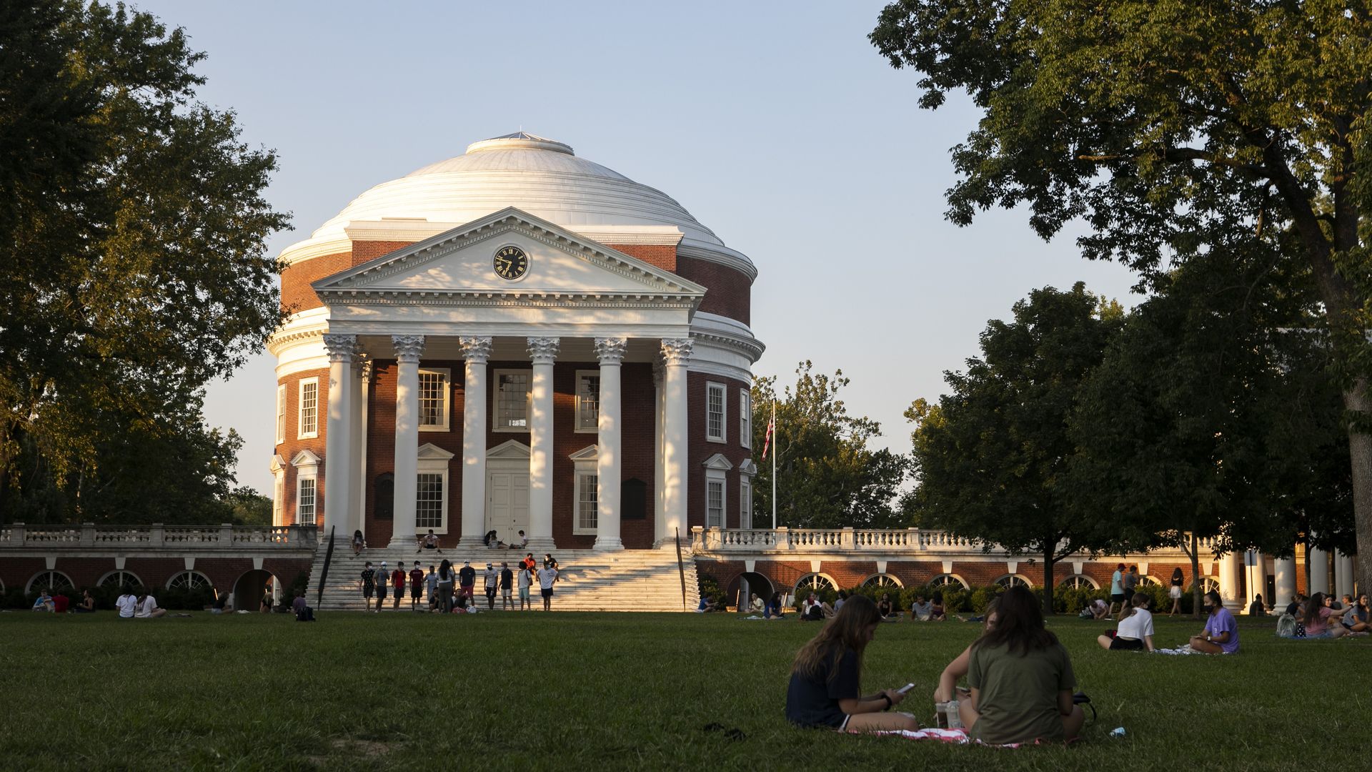 people in front of the uva rotunda
