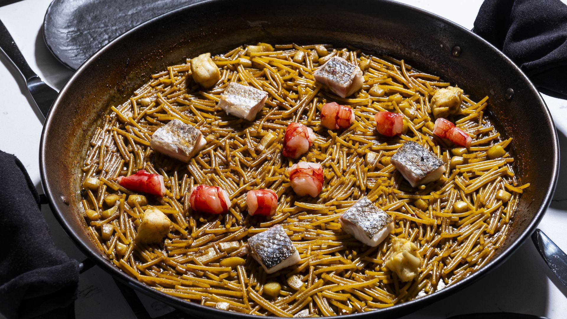 A traditional Valencian fideuà with sea bass, cuttlefish and prawn. Photo: courtesy Scott Suchman