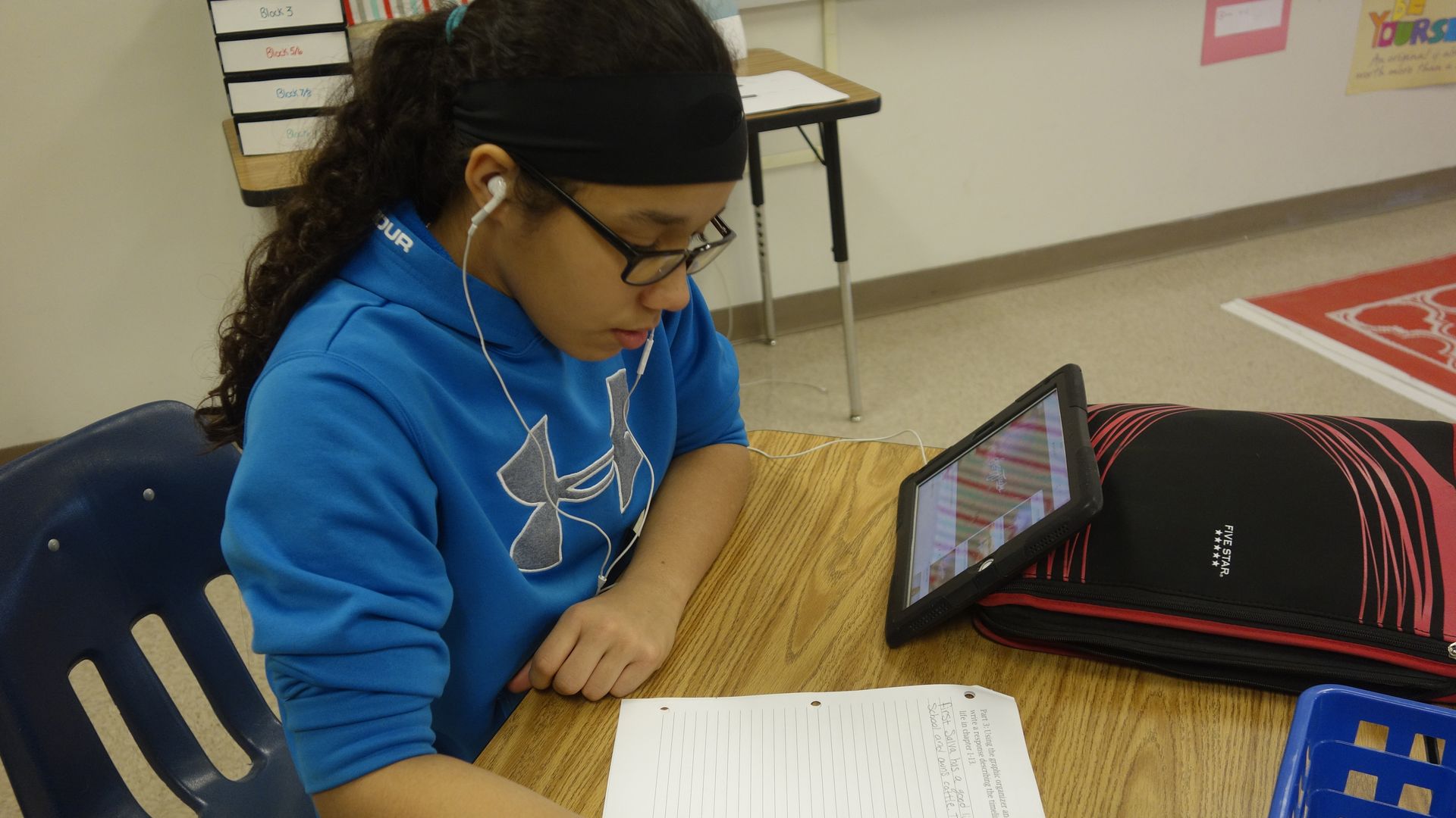 Child using ipad to learn