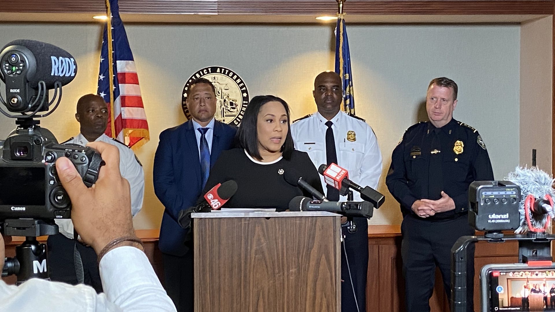 Fulton District Attorney Fani Willis addresses reporters with Sheriff Patrick Labat and Police Chief Rodney Bryant