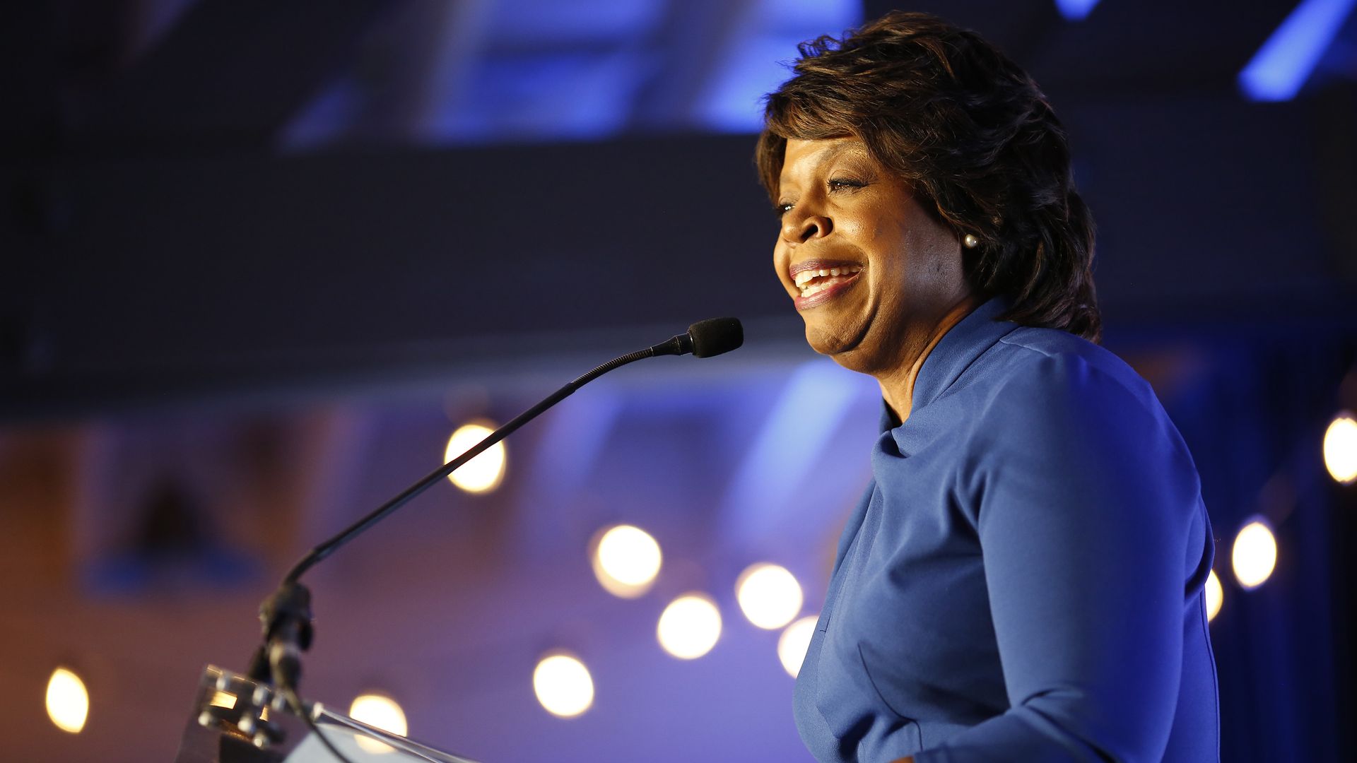 Cheri Beasley, speaking from a podium on primary election night