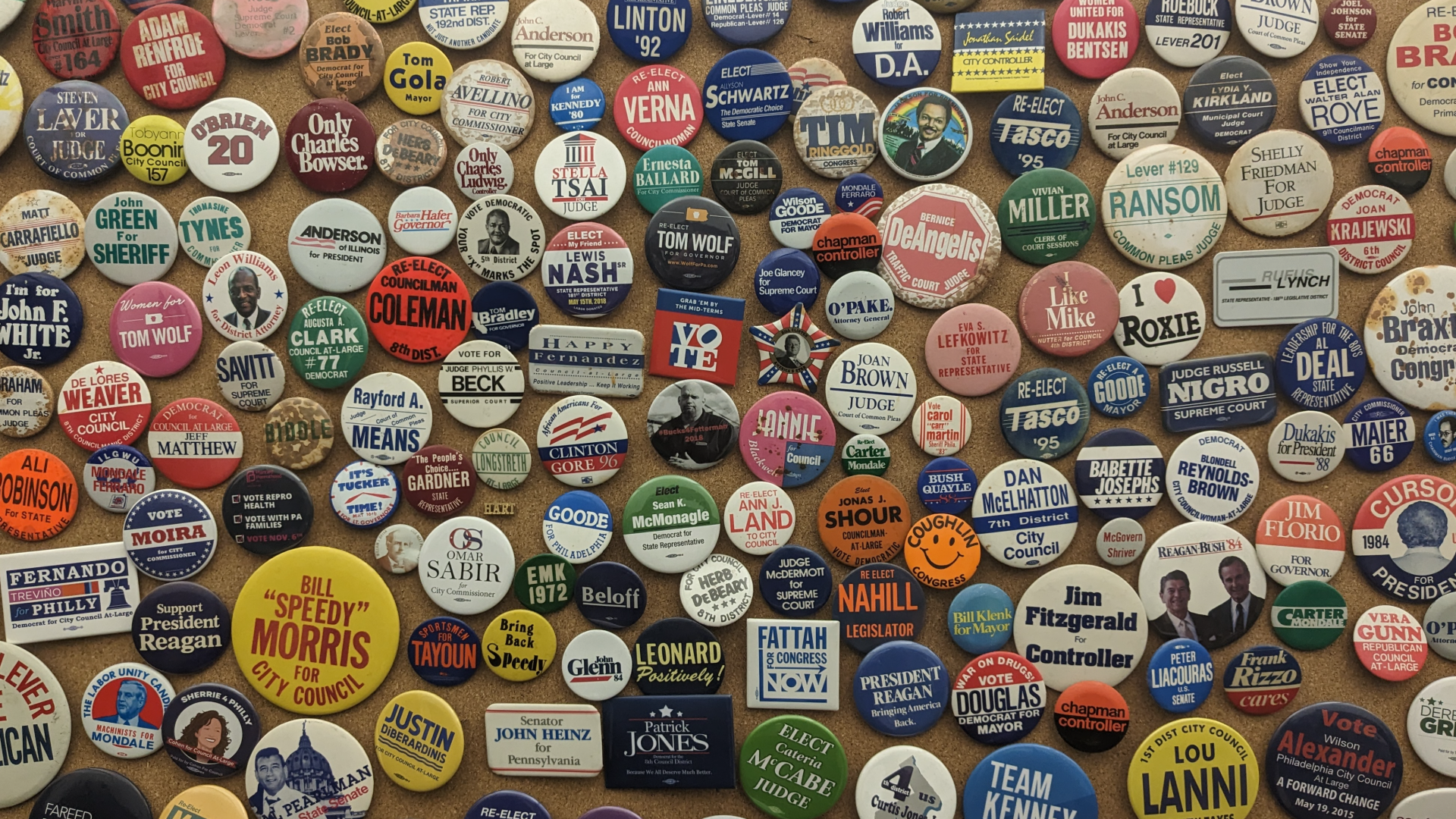 A wall of campaign pins