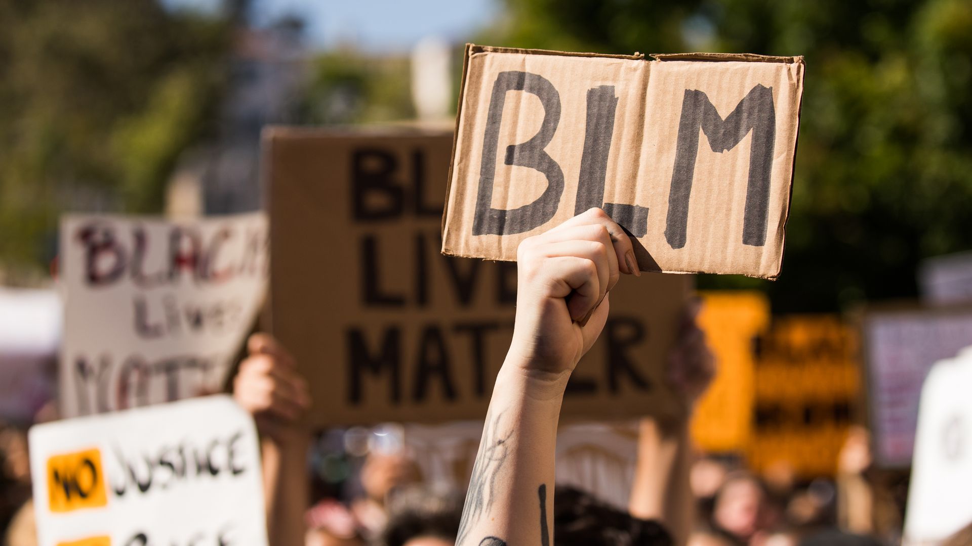 A Los Angeles protester on Sunday. Photo: Rich Fury/Getty Images