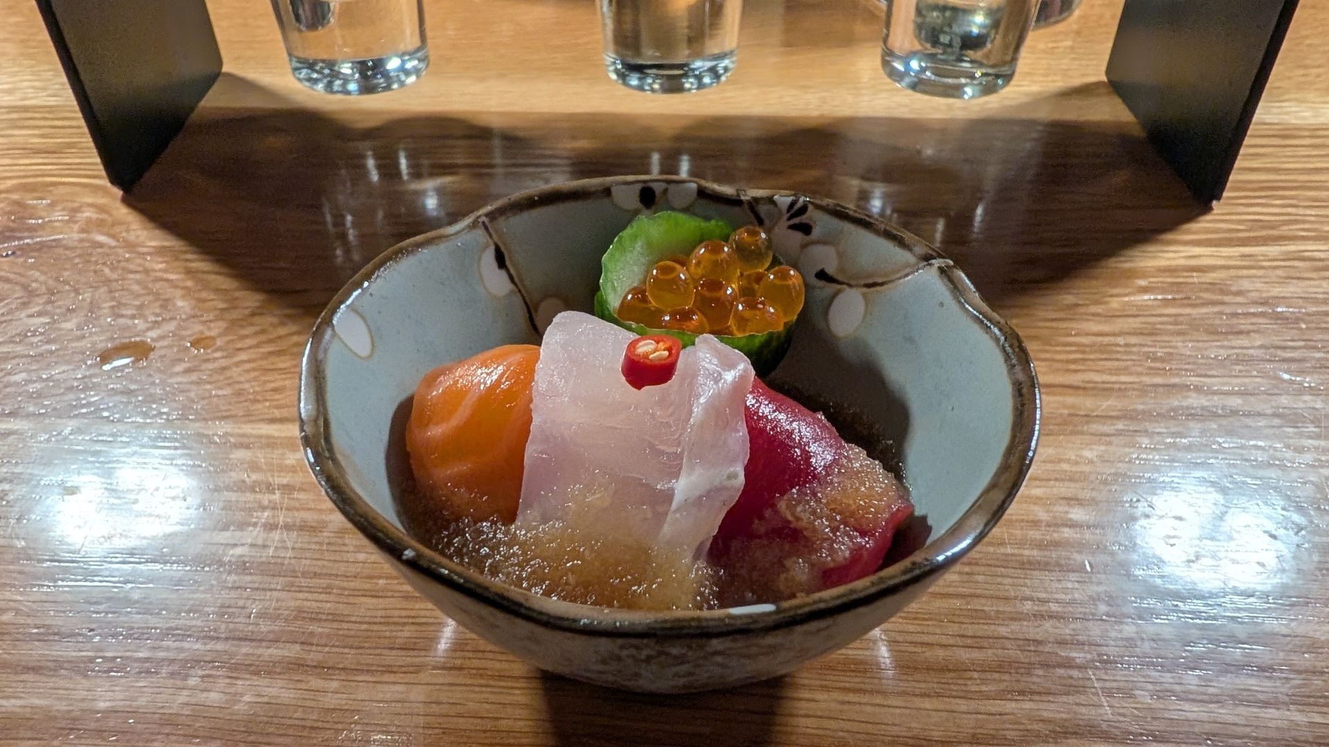 A sushi bite in a bowl