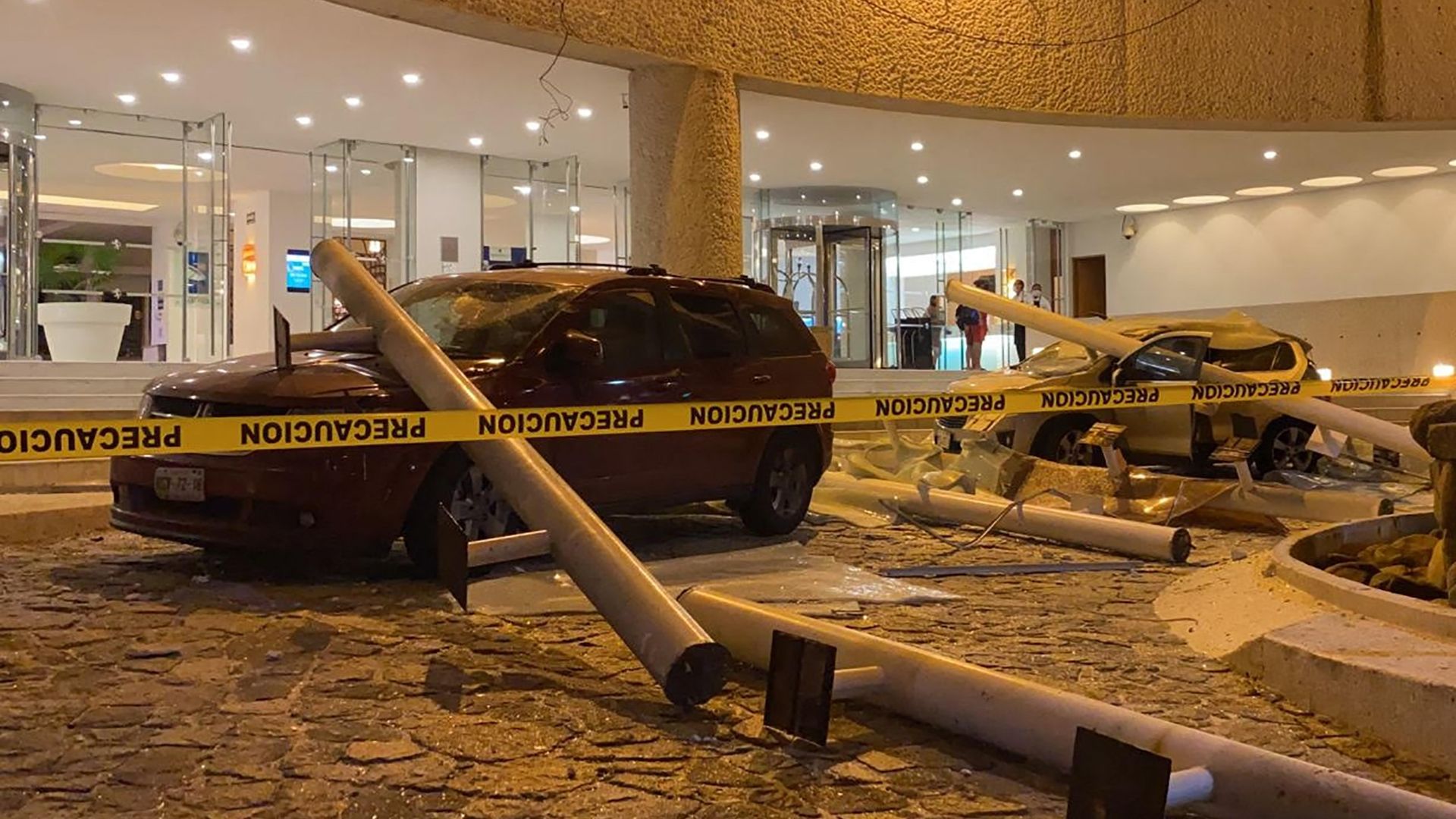 View of damaged cars outside a hotel after a quake in Acapulco, Guerrero state, Mexico on September 7