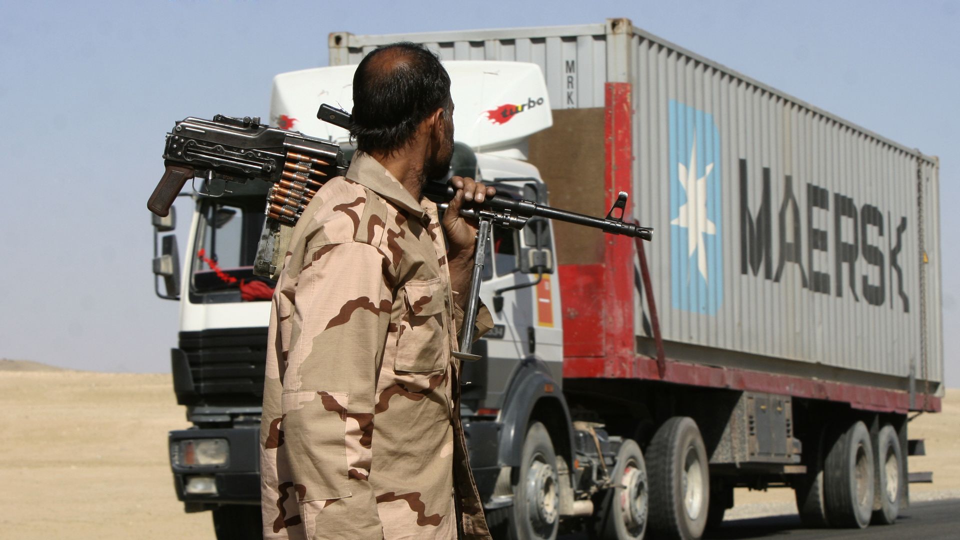 NATO contractor guarding truck in Afghanistan