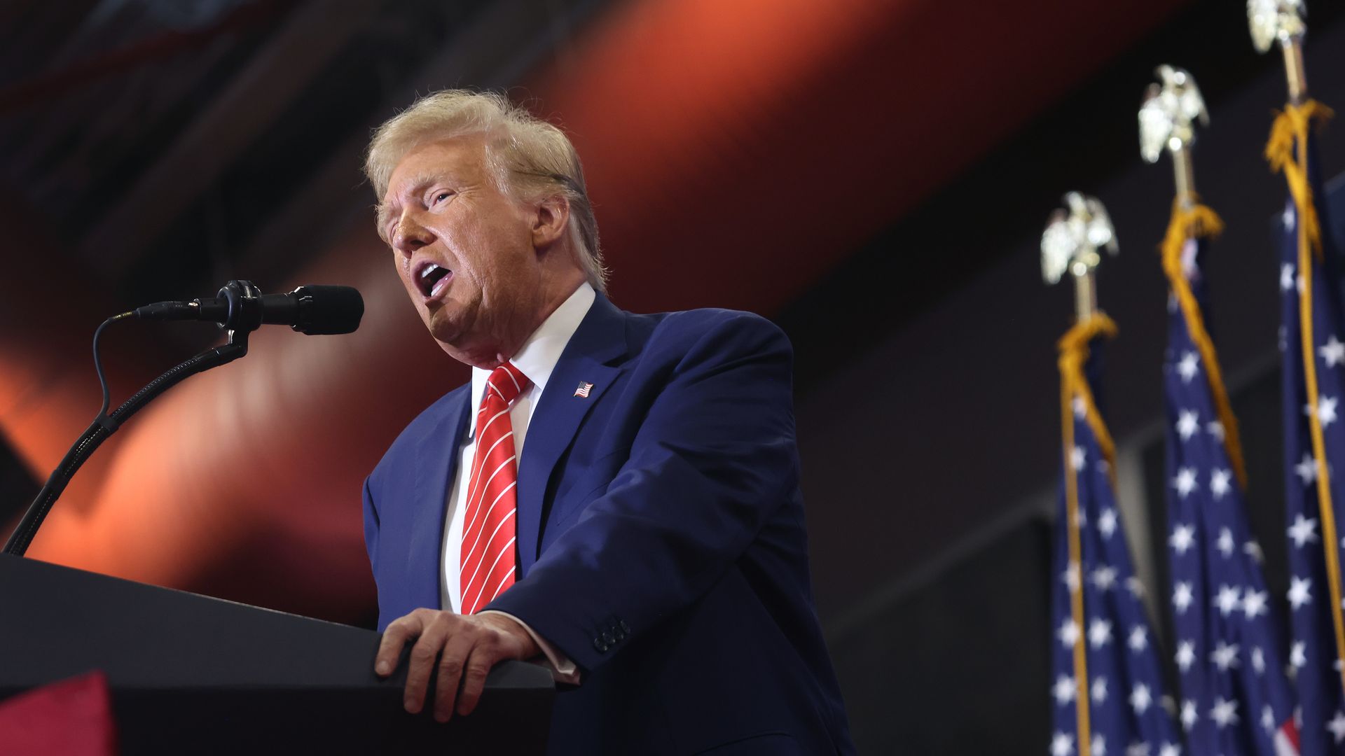 Donald Trump speaks to guests during a rally at Clinton Middle School on January 06, 2024 in Clinton, Iowa