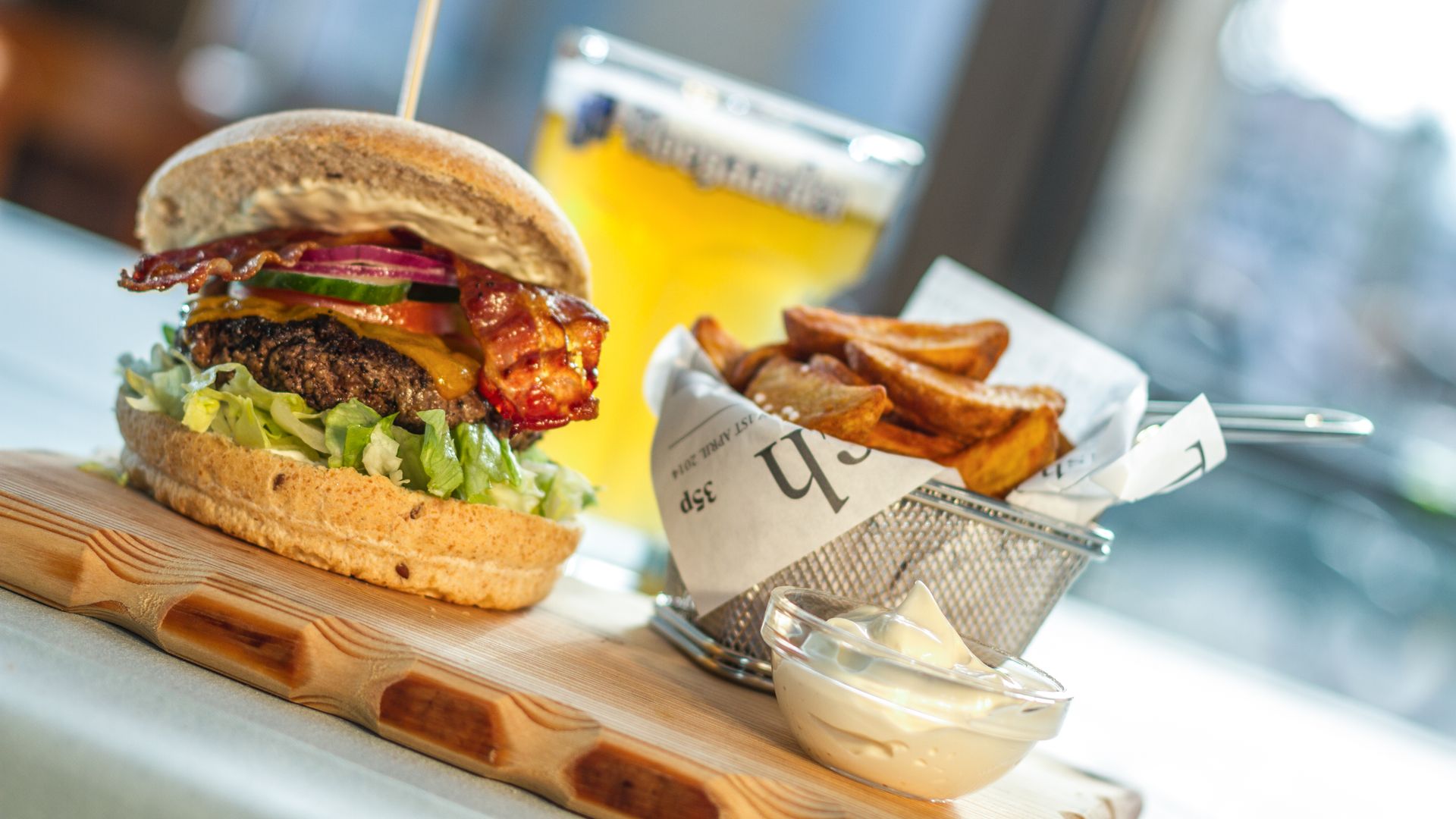 Burger and fries with a drink