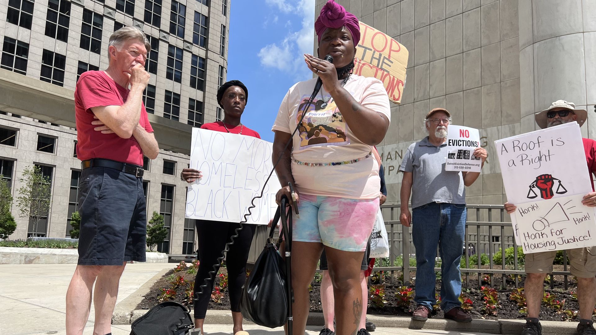 Members of Detroit Eviction Defense gather downtown to demand permanent affordable housing. 