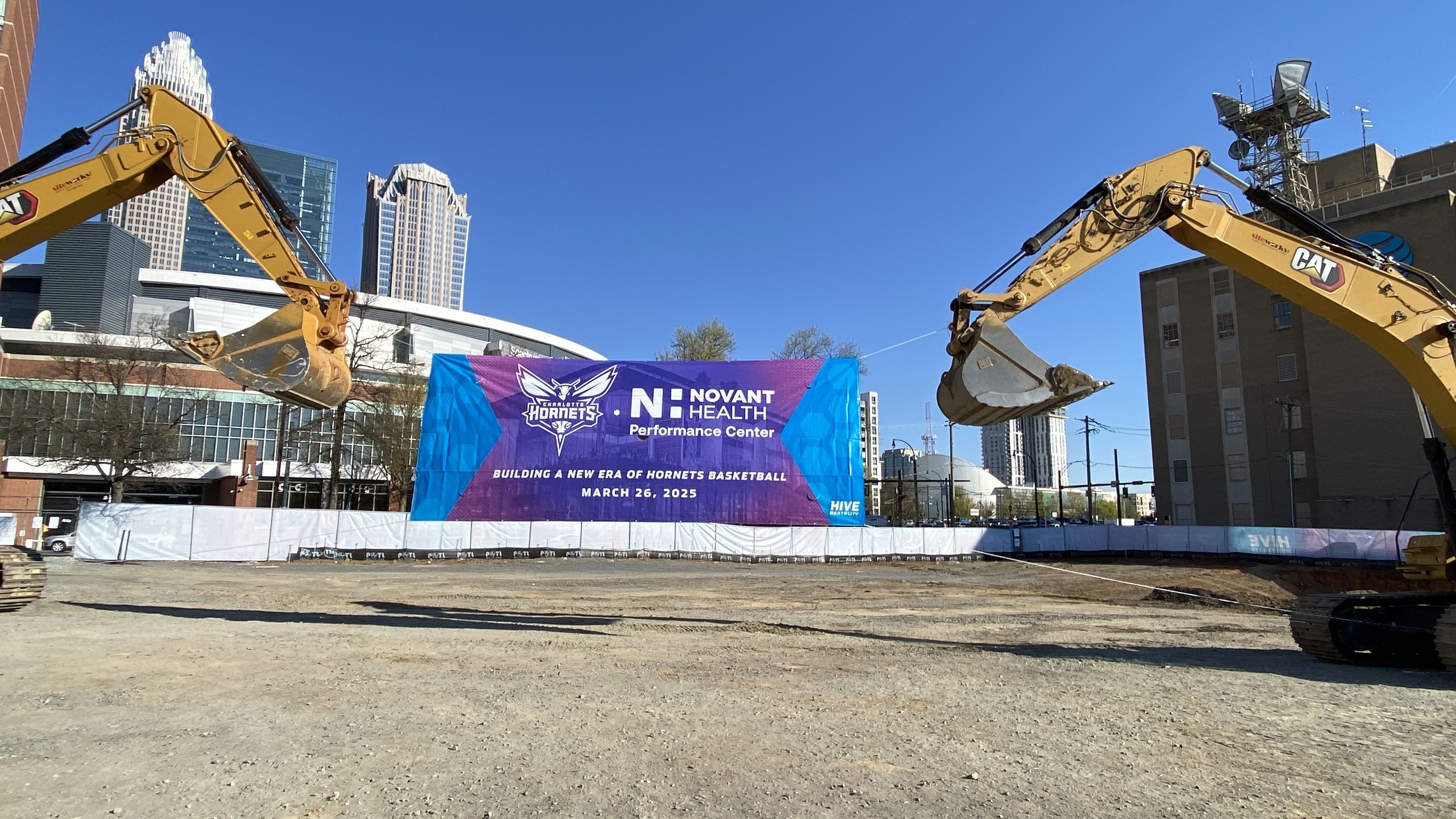 Bulldozers at the Hornets groundbreaking. 