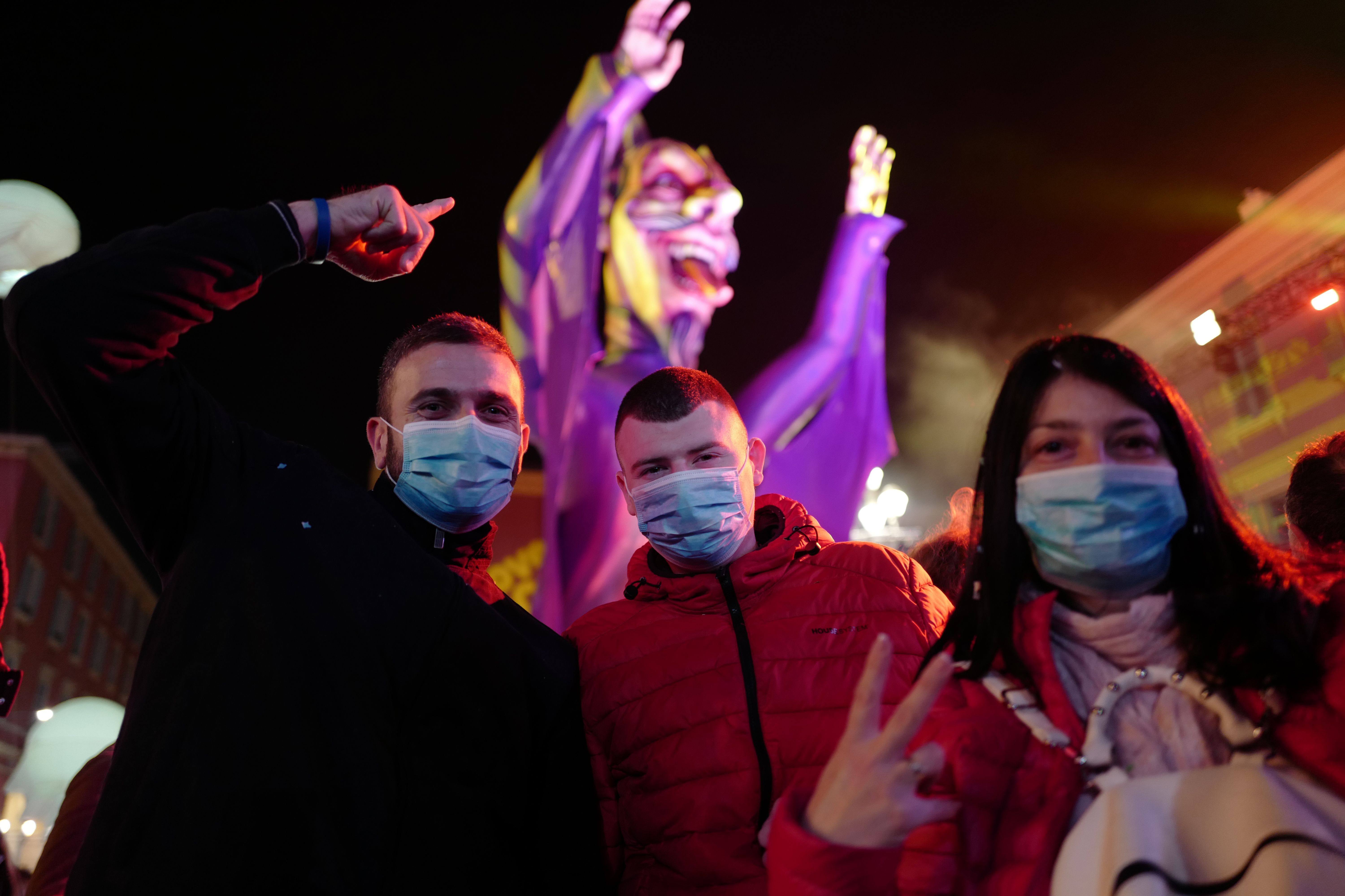  Revellers wear masks to protect themselves from the COVID-19 illness as they attend the Nice carnival