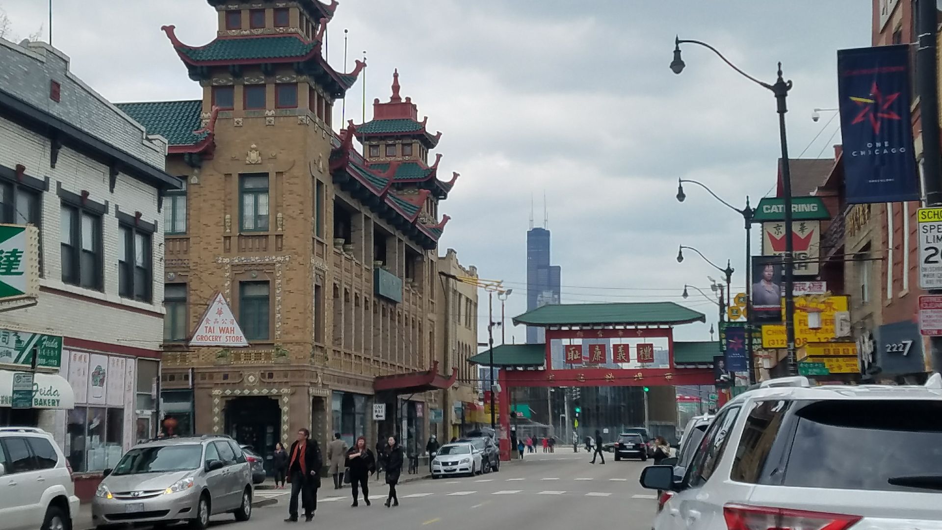 Photo of a street with Chinese architecture.