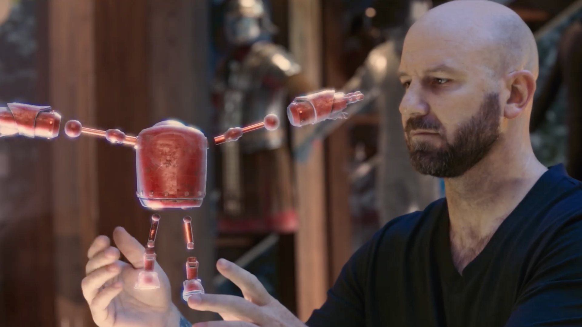 Photo of Facebook's Andrew Bosworth with a red robot avatar