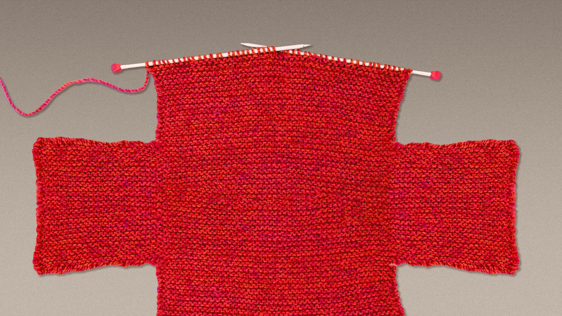 Illustration of knitting needles making a red health plus.