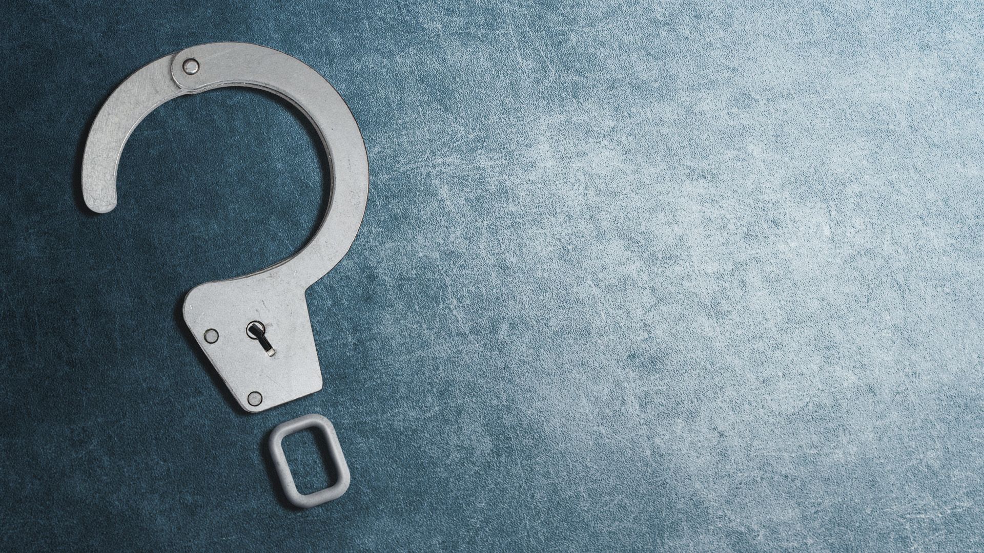 Illustration of a handcuff in the shape of a question mark