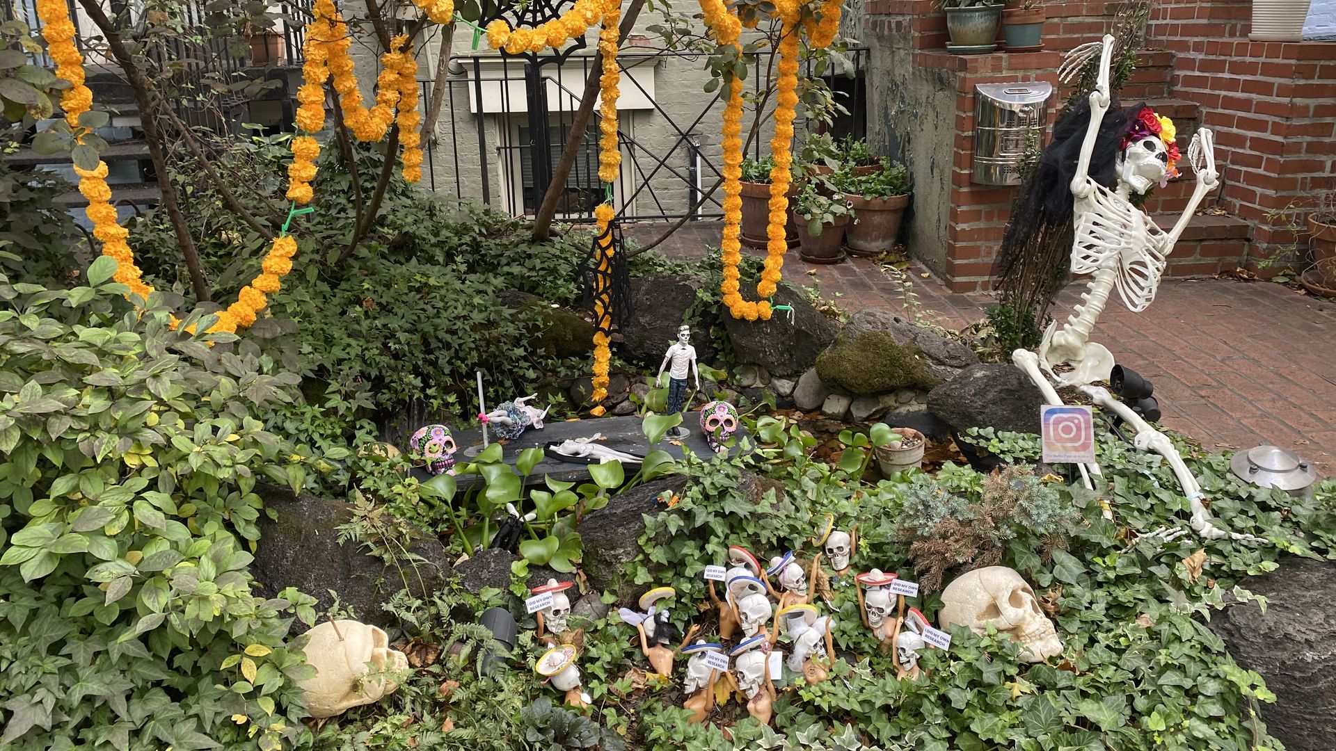 Barbie Pond has a display of naked Barbies dressed for Day of the Dead.