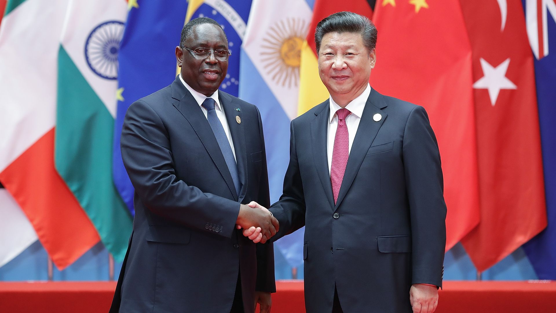 Chinese President Xi Jinping shakes hands with Senegalese President Macky Sall at the G20 Summit.