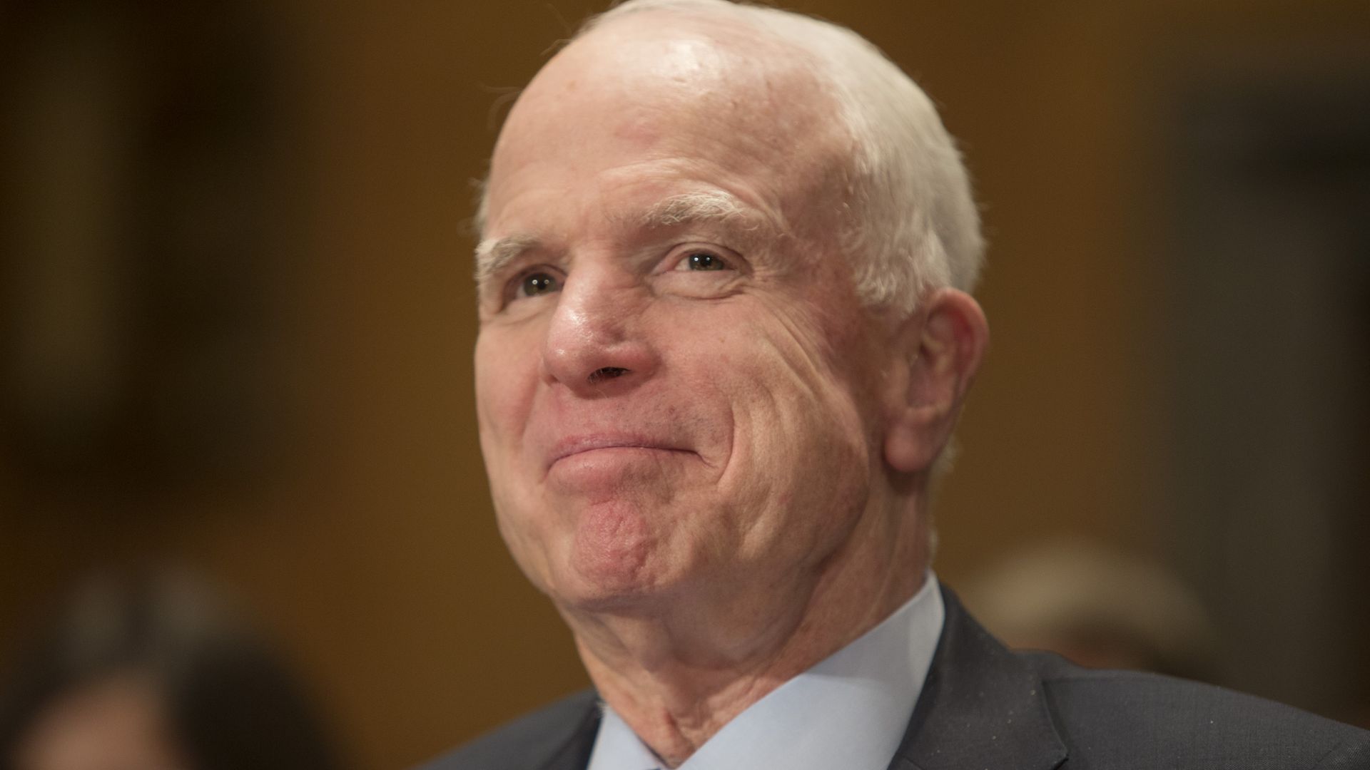 Senator John McCain, smiling.