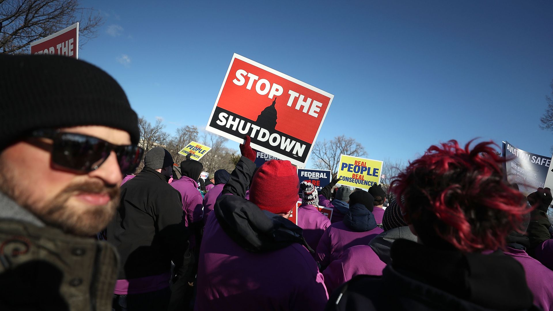 People rally against the partial federal government shutdown outside the U.S. Capitol