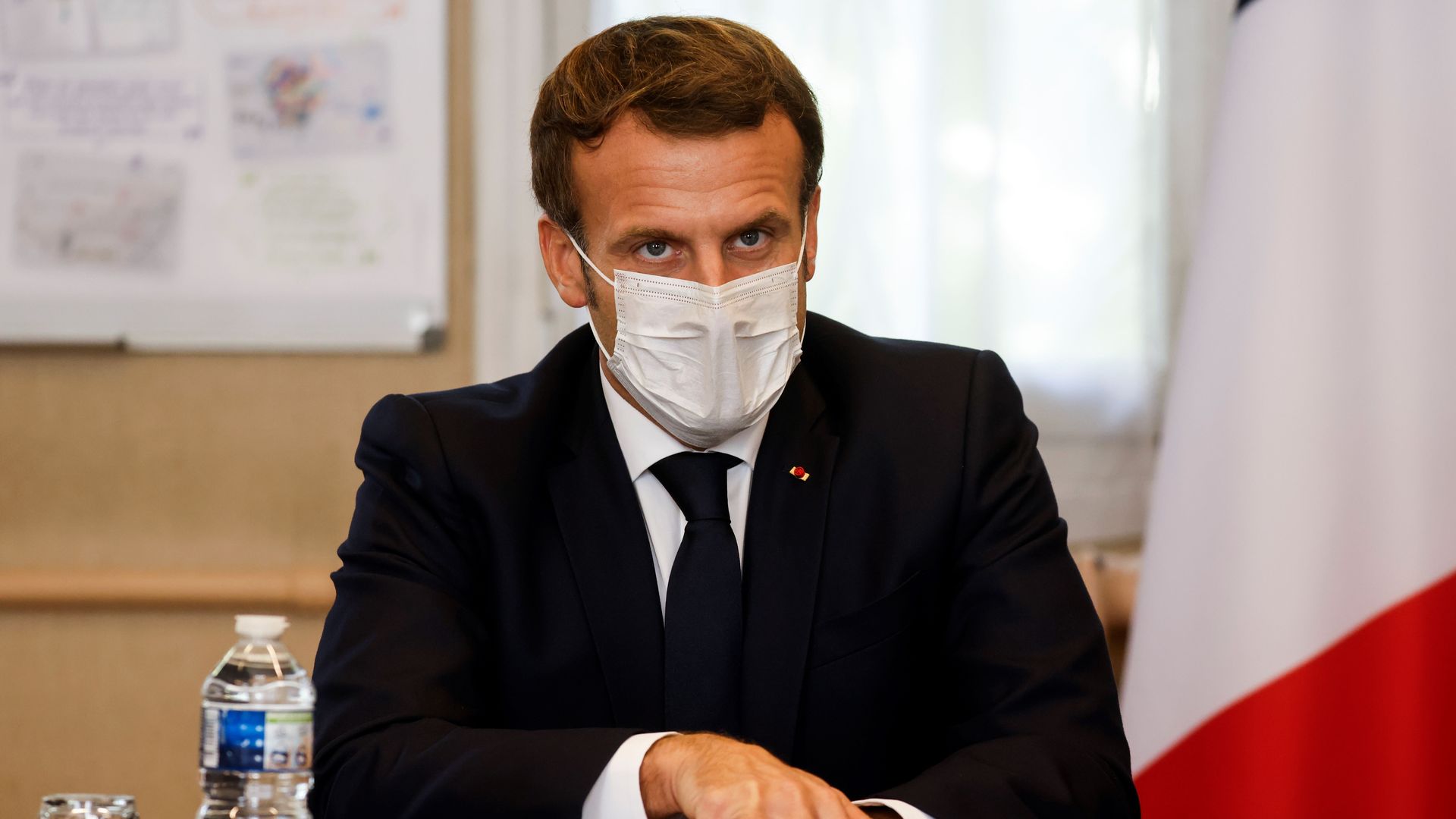 Picture of French President Emmanuel Macron wearing a mask.