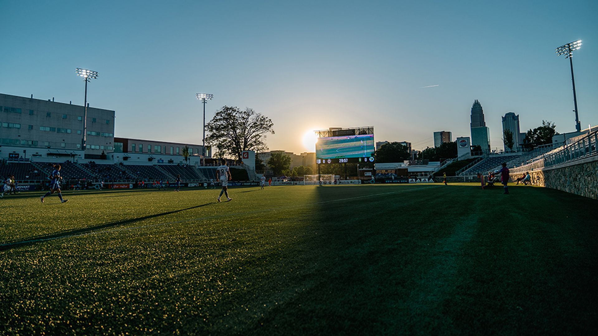 Charlotte Independence play at American Legion Memorial Stadium with the Charlotte Skyline in the background.