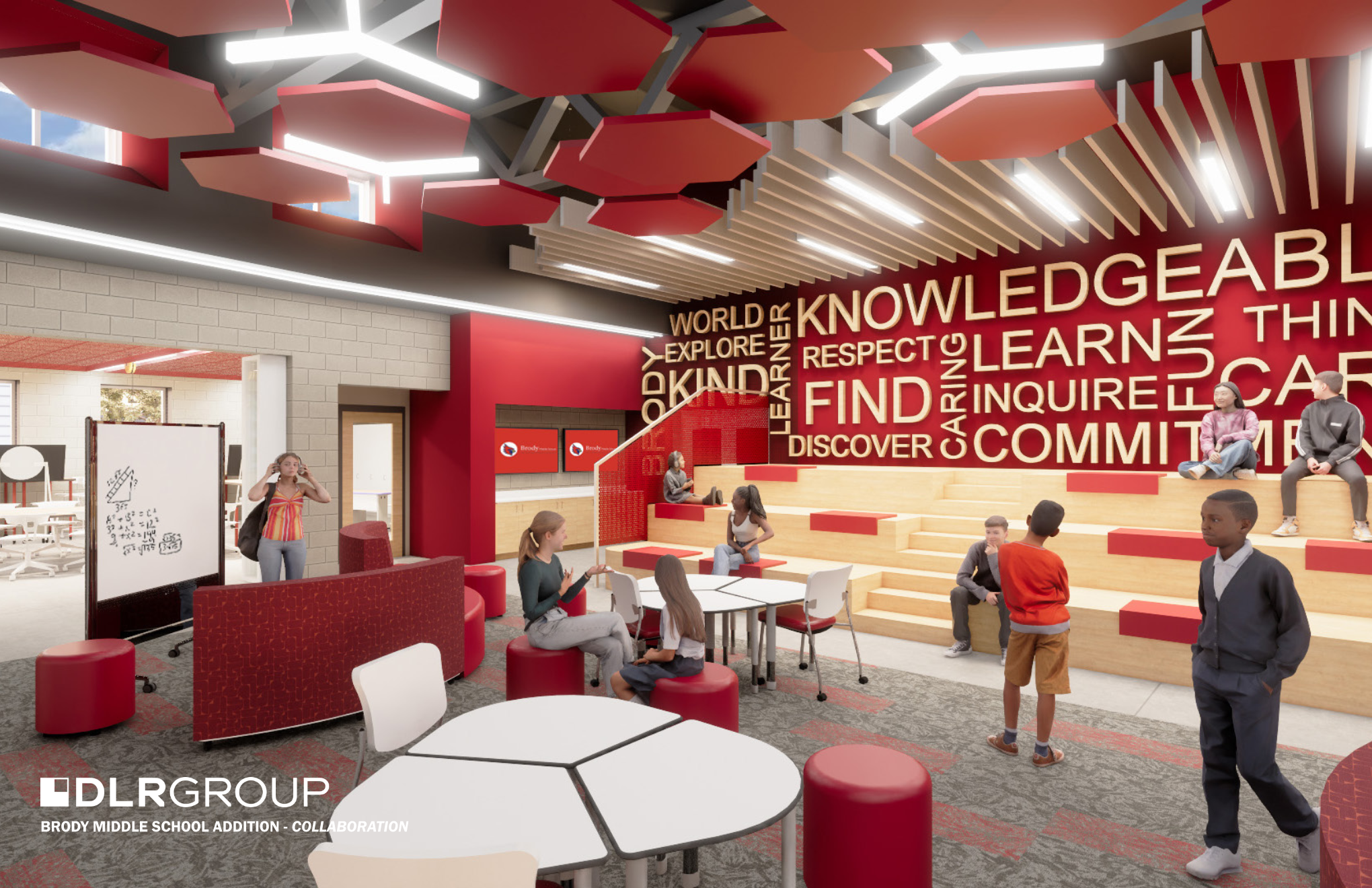 Bright school collaboration space with red accents, hexagonal ceiling panels, tiered wooden seating with red cushions, and walls displaying positive words like "KNOWLEDGEABLE" and "COMMITMENT".