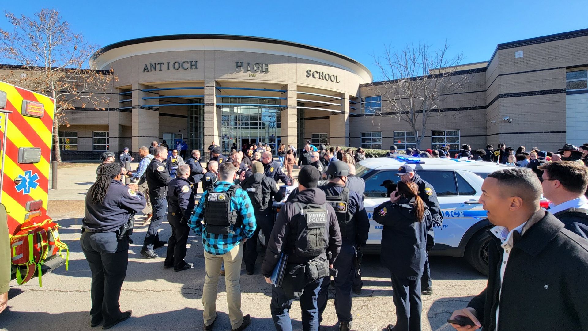 A crowd of emergency workers at Antioch High School.