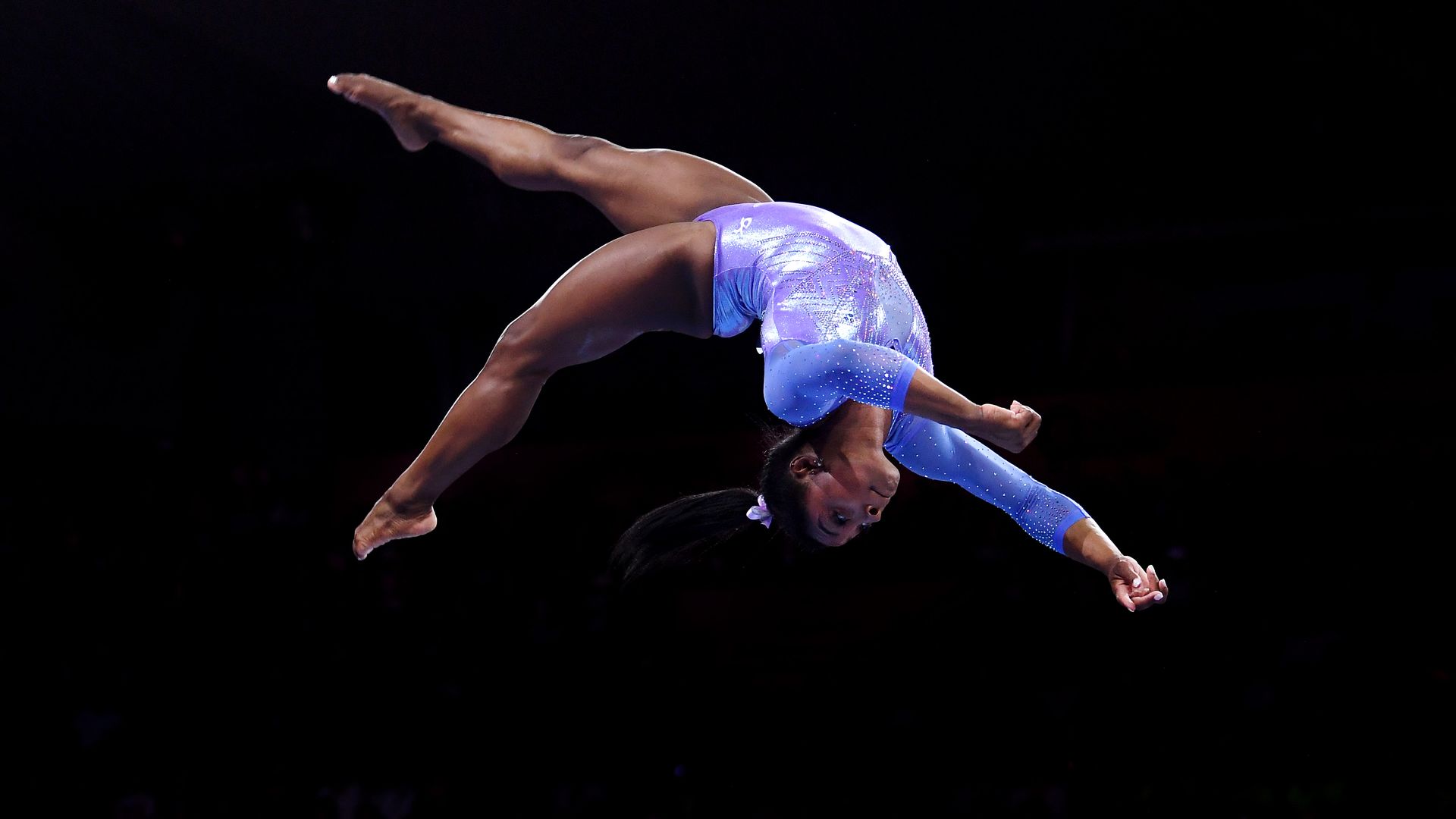 Simone Biles competes on the balance beam on Oct. 13, 2019.