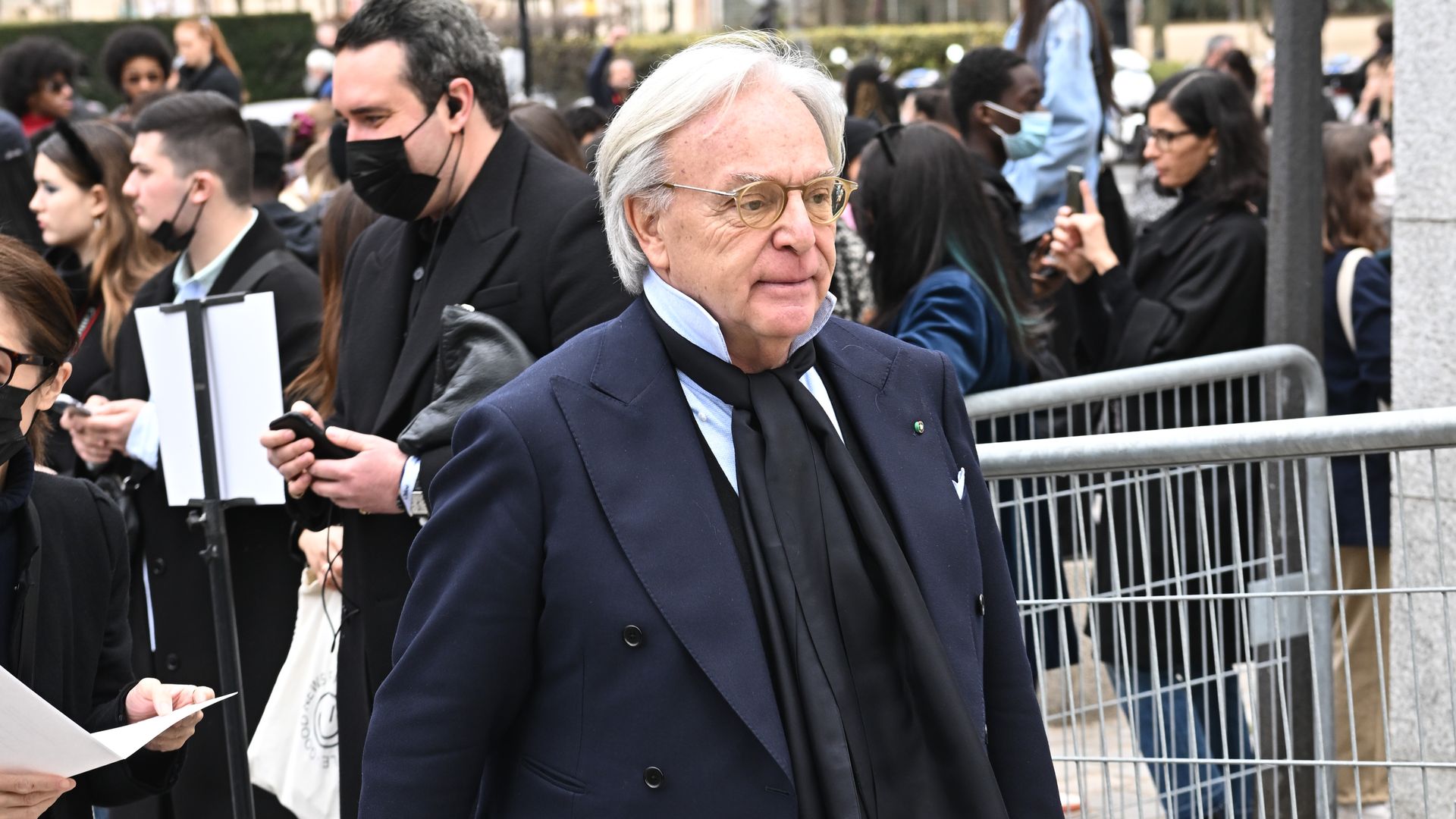 Diego Della Valle, the CEO of luxury brand Tod's, wears a dark coat at a fashion show in Paris.