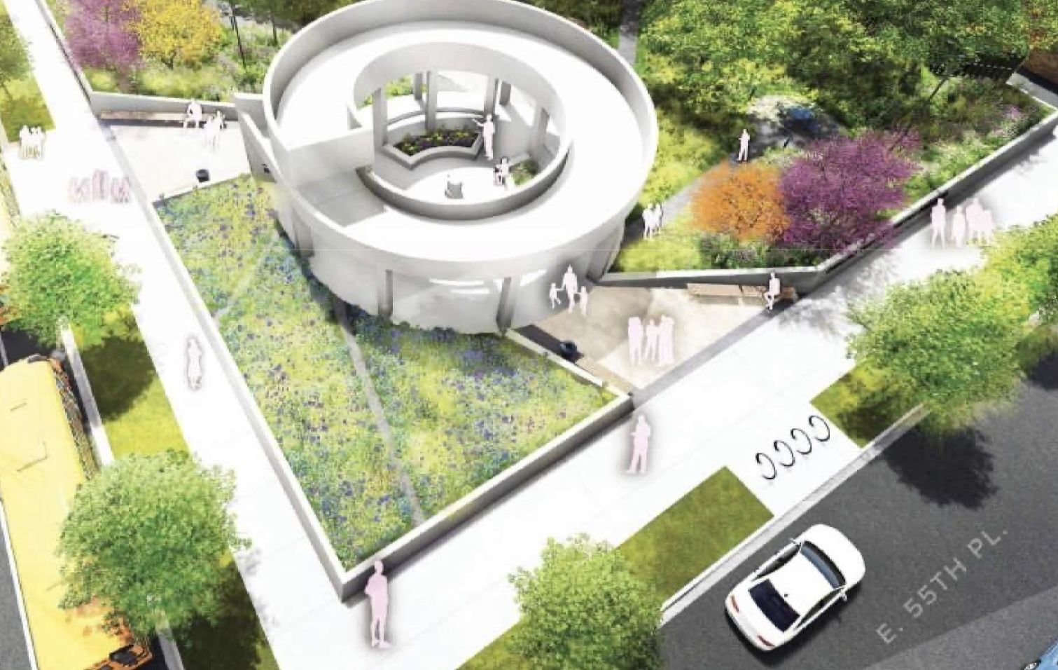 An aerial view of a circular white pavilion with a spiral ramp and central courtyard, set in a lush park with colorful trees and blue flowers. Silhouetted people walk along paths; a white car on the street.