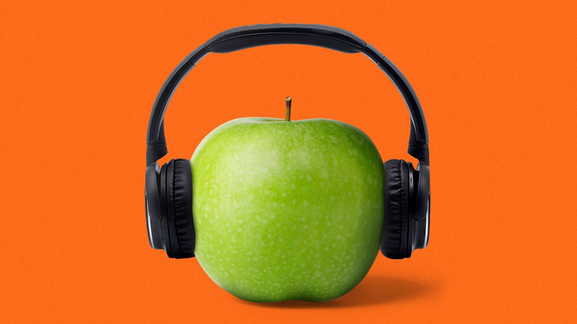 Illustration of a green apple wearing headphones. 