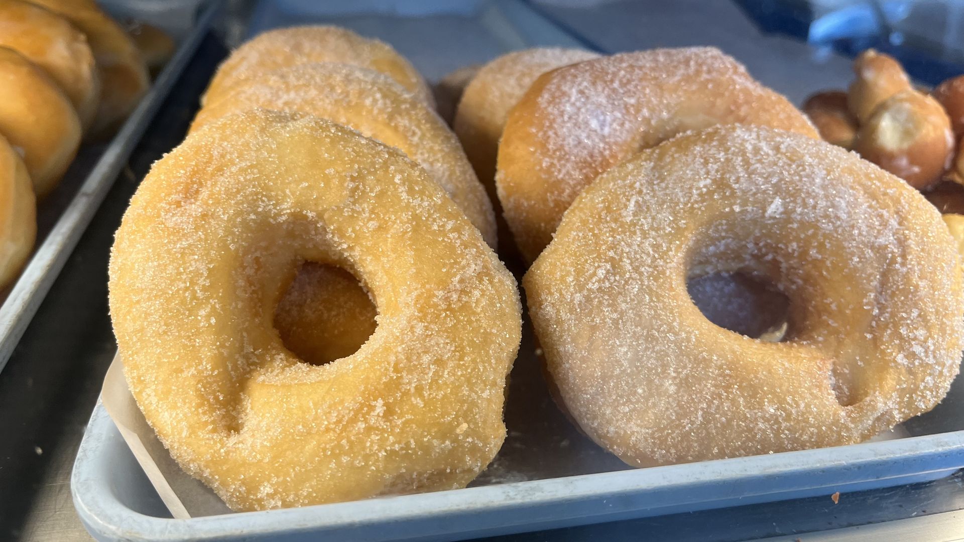 Sugar doughnuts on a tray