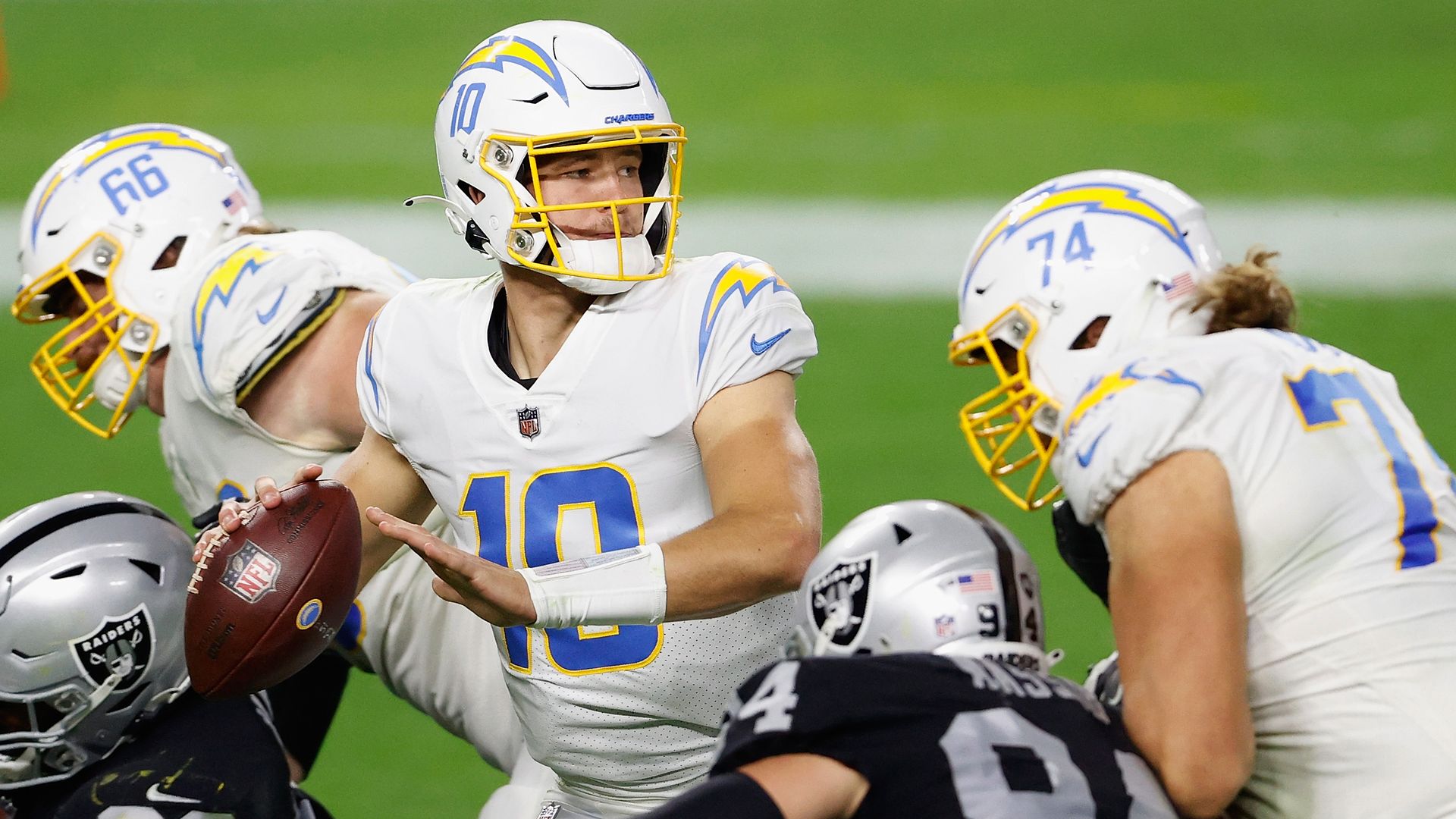 Chargers quarterback Justin Herbert drops back to pass