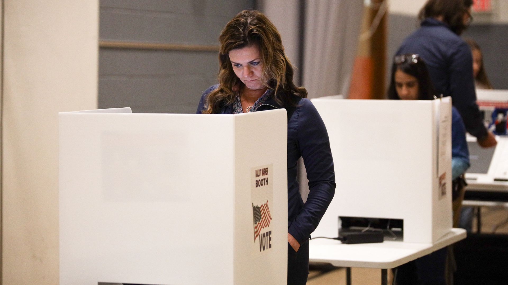 A woman casts her ballot in Columbus.