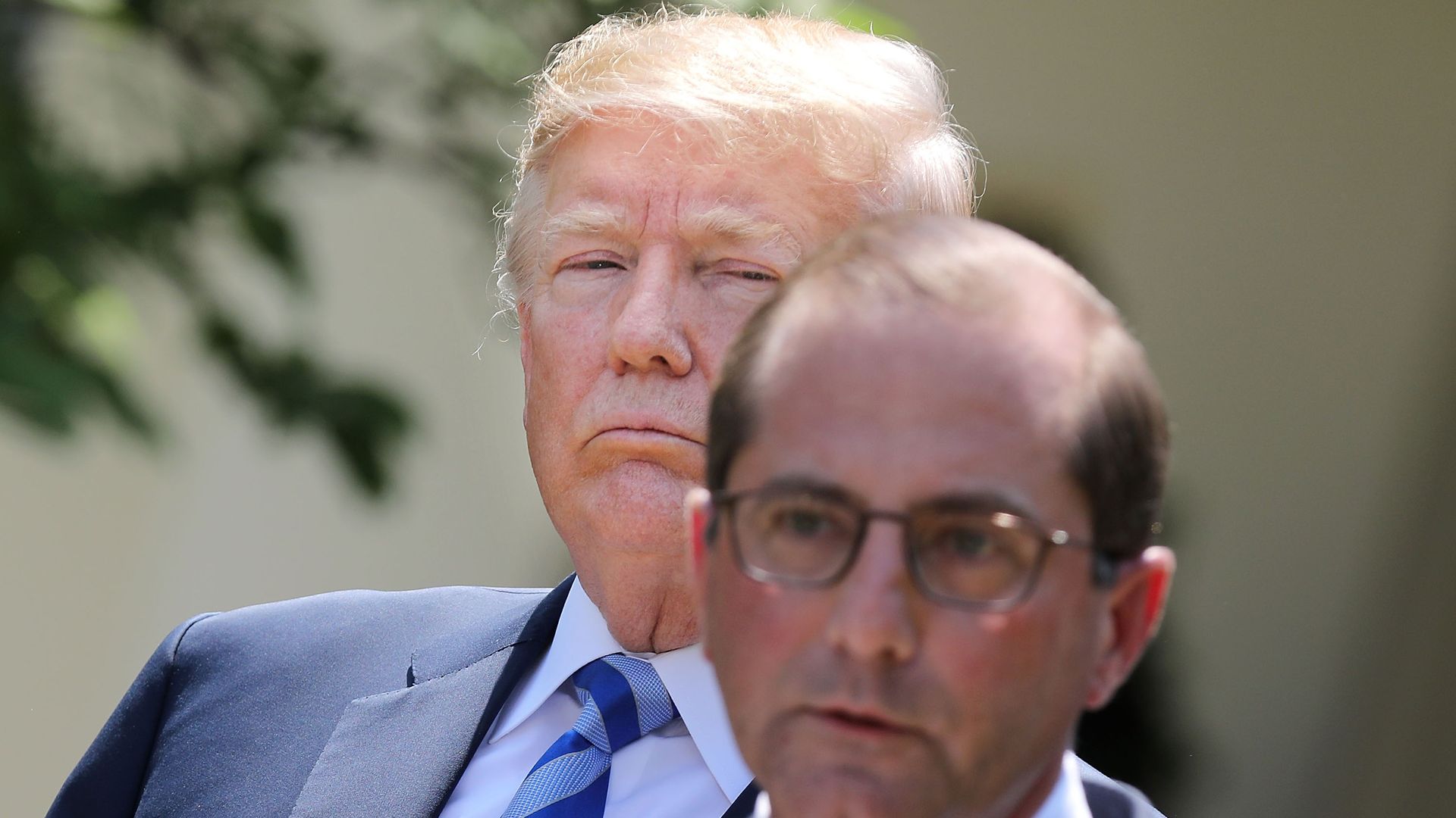 President Trump listens as HHS Secretary Alex Azar talks.