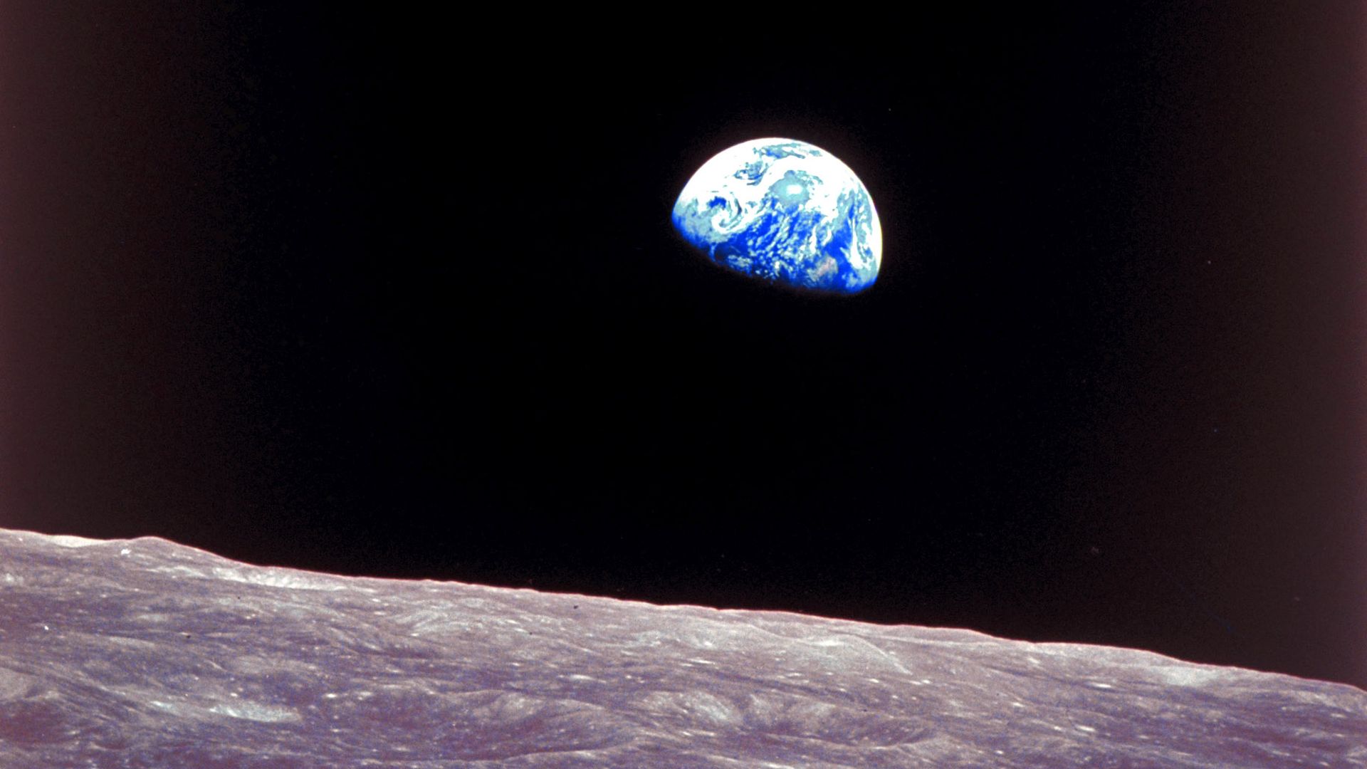 Apollo 8 photo of the earth rising over the moon