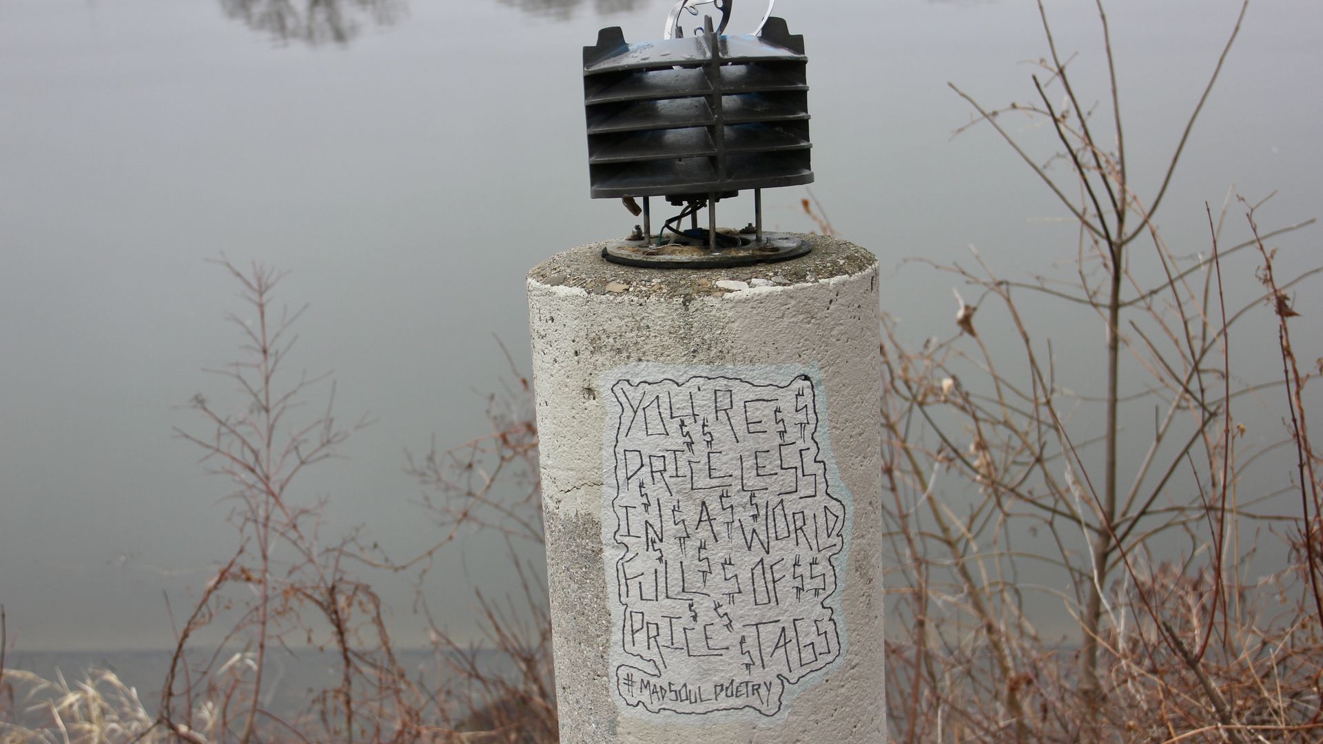 A broken light post saying, "You're priceless in a world full of price tags."