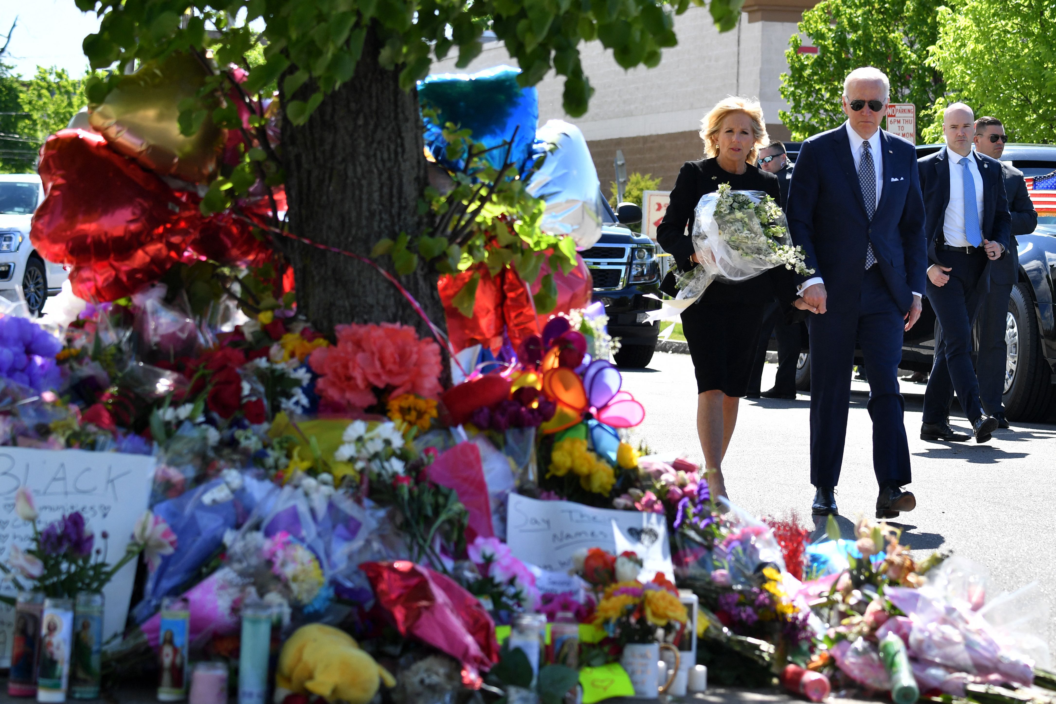 Jill Biden with flowers at Tops market memorial