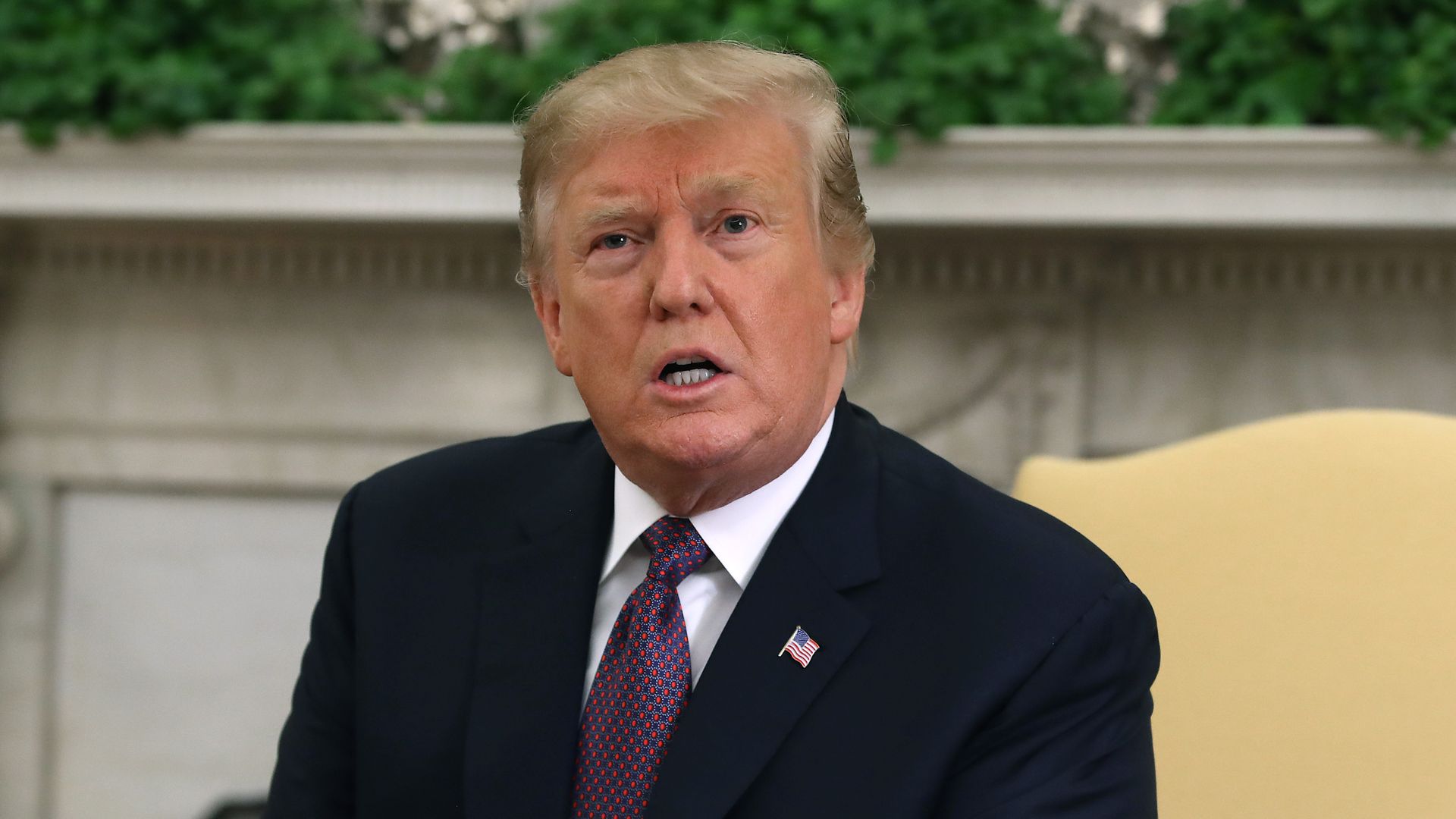 President Trump gestures.