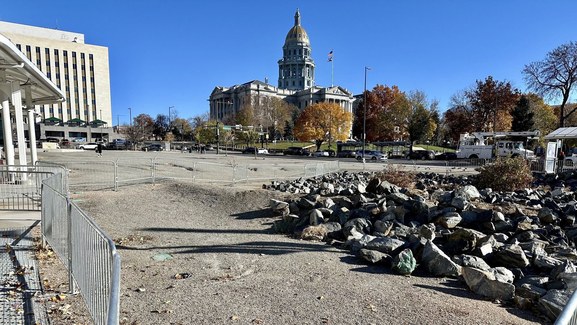 The gravel lot where the city envisions six pickleball courts. Photo: John Frank/Axios