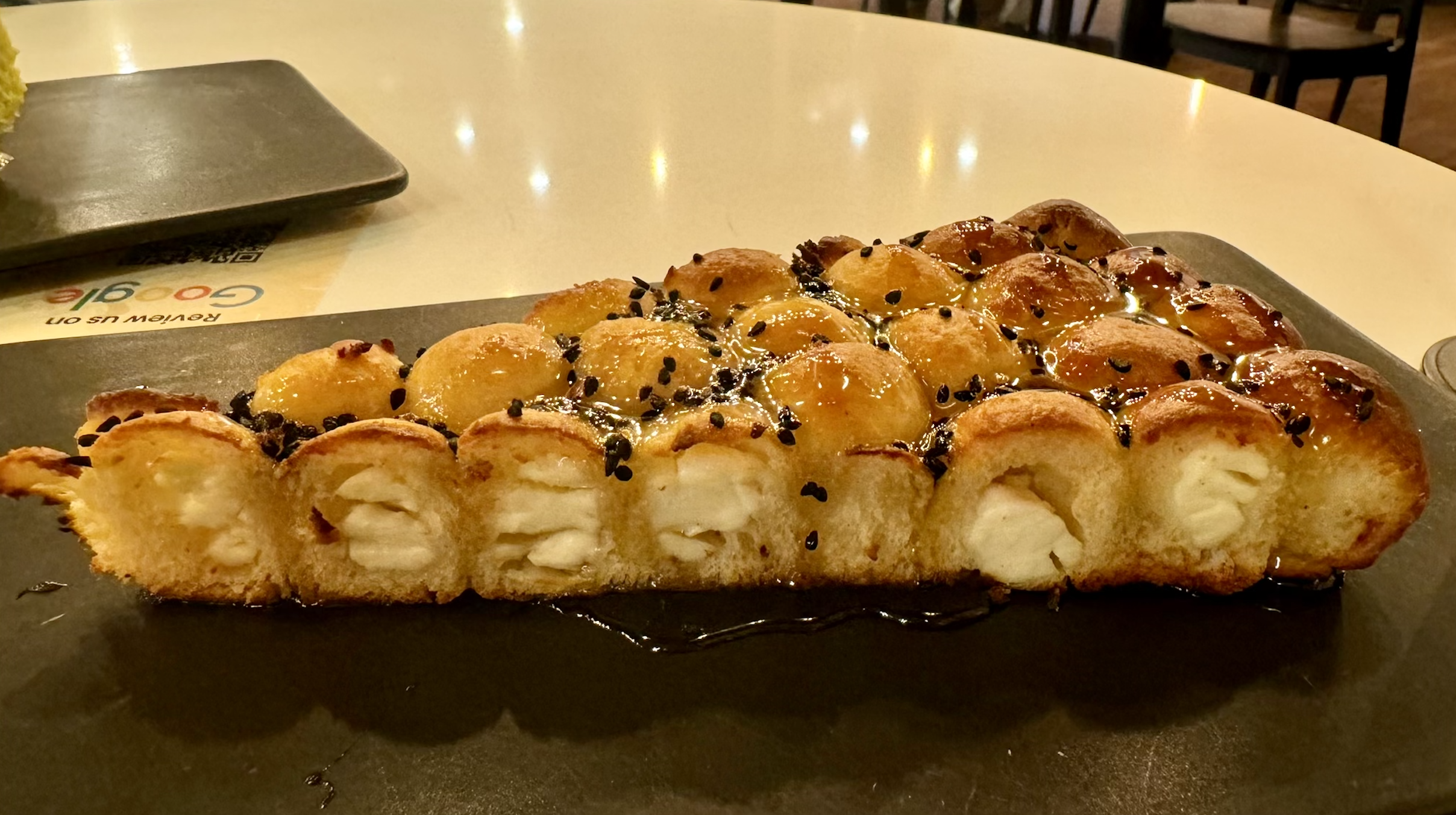 A honeycomb-shaped pastry on a plate