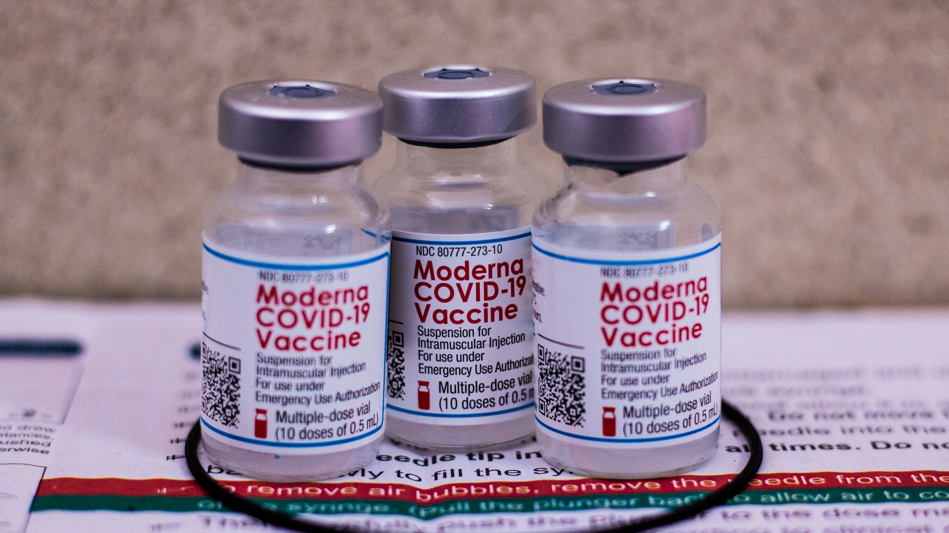 Three vials of Moderna vaccine