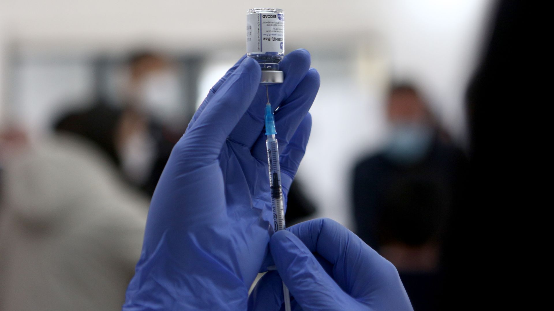 needle and coronavirus vaccine