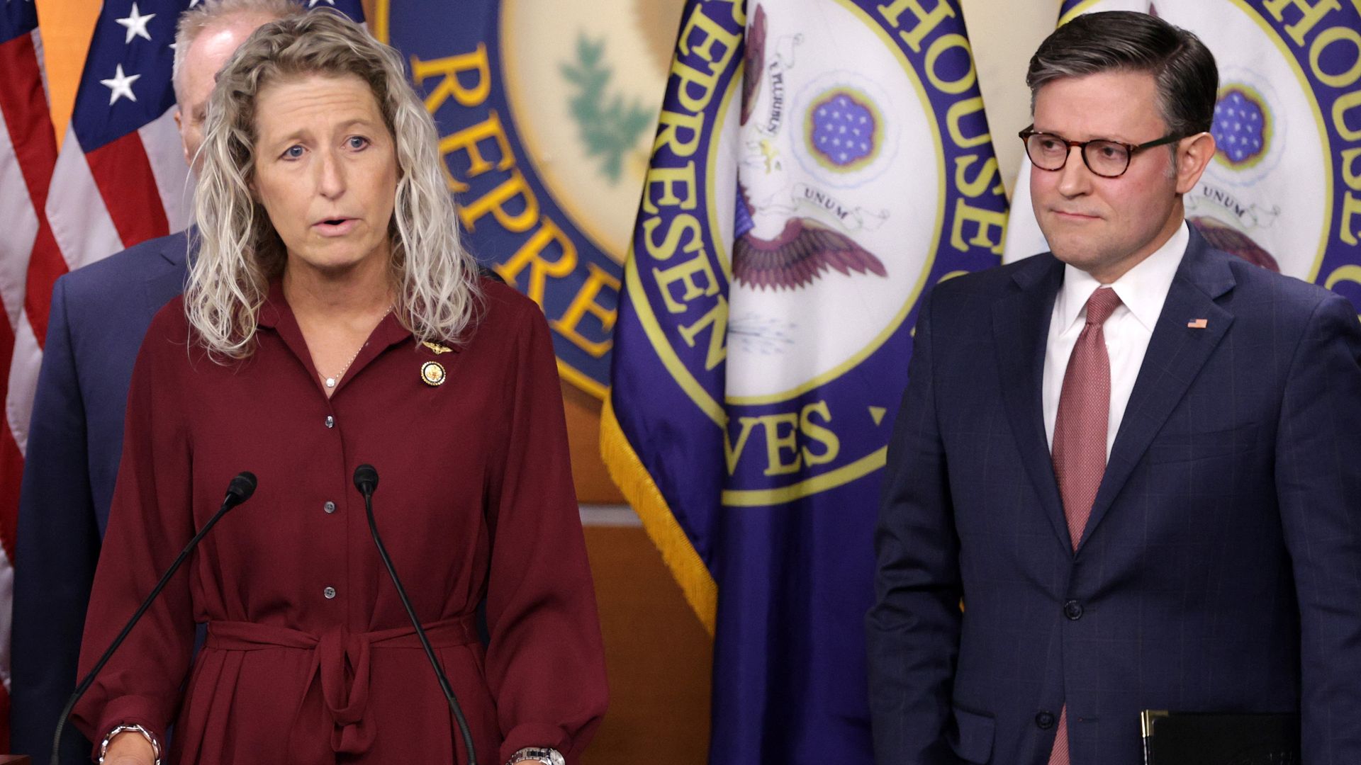 Rep. Jen Kiggans speaks during a news conference at the Capitol with House Speaker Mike Johnson behind her