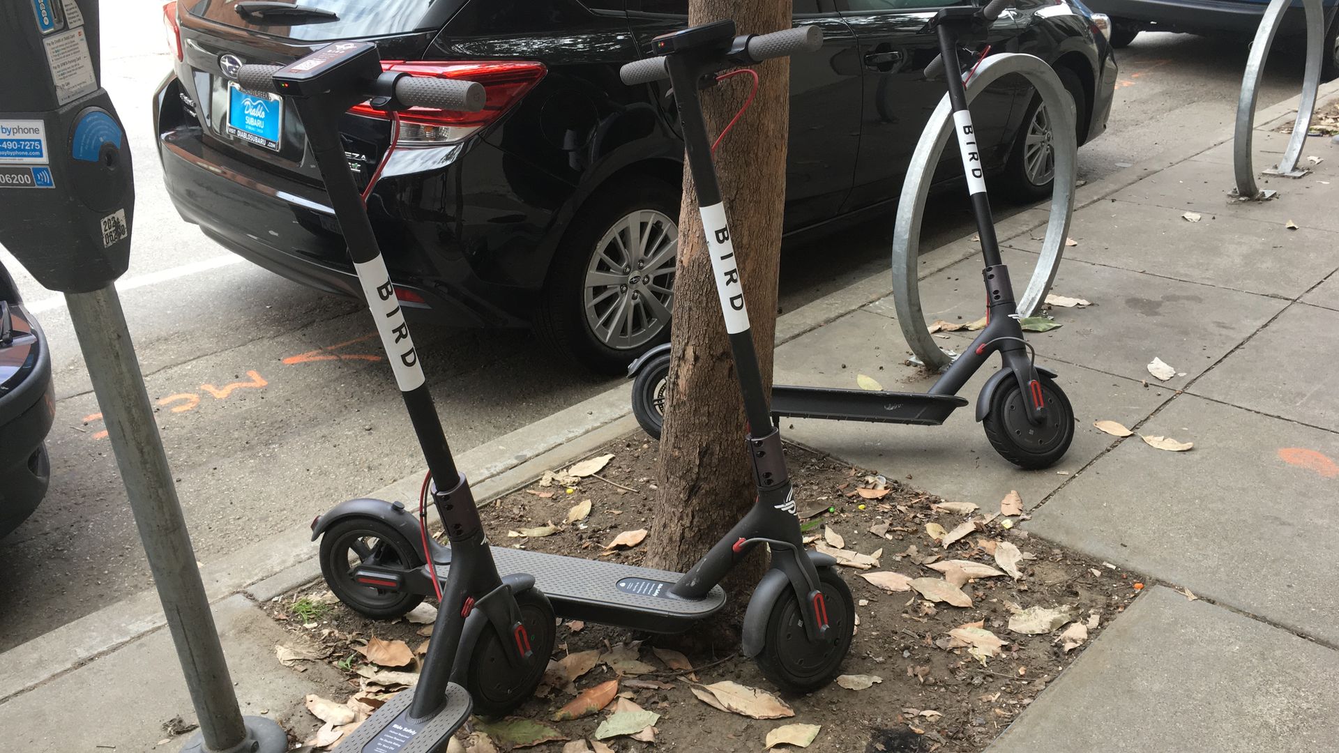 Scooters pile up on a San Francisco sidewalk