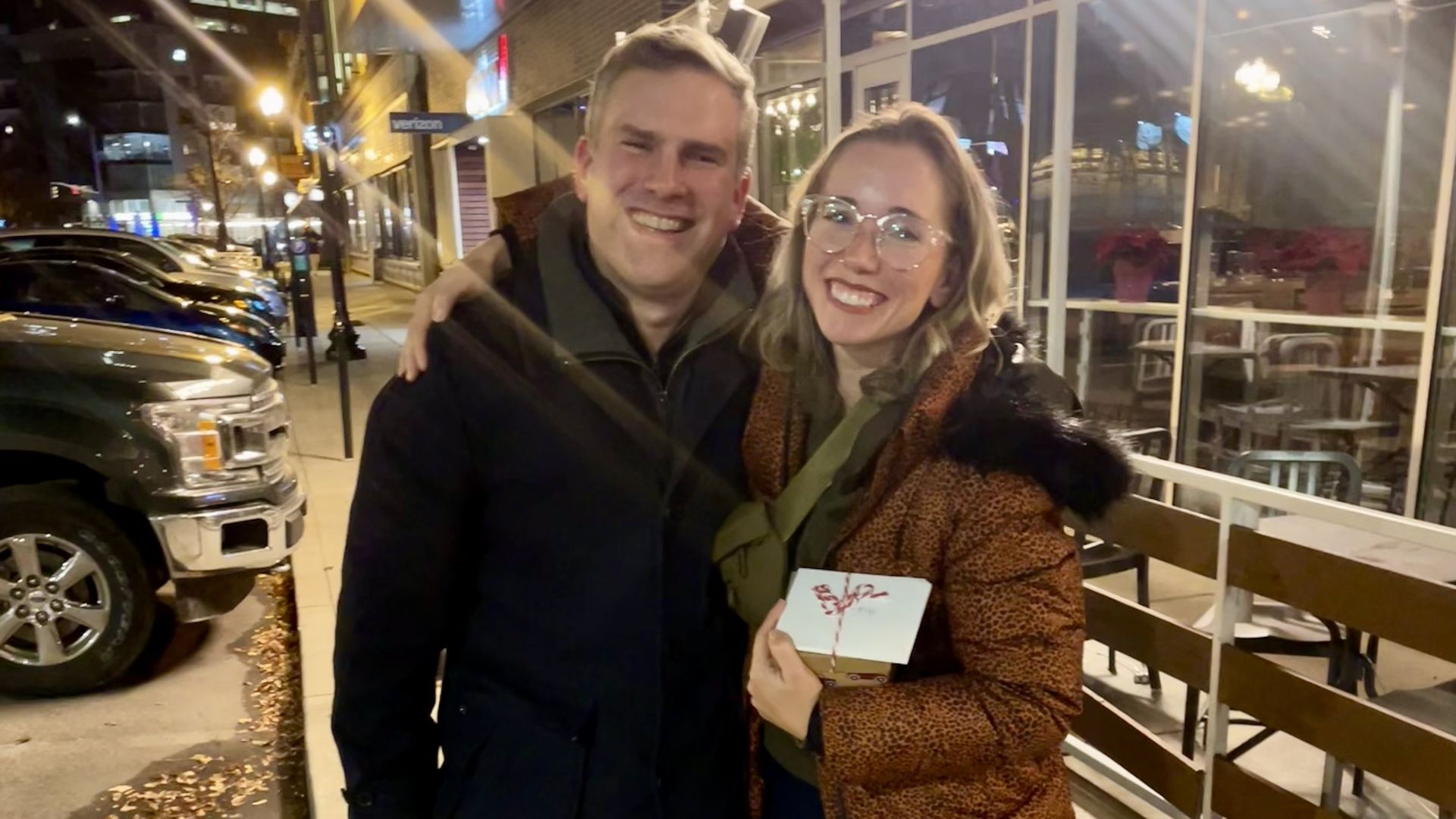 James and Arika standing on the sidewalk on Mass Ave.