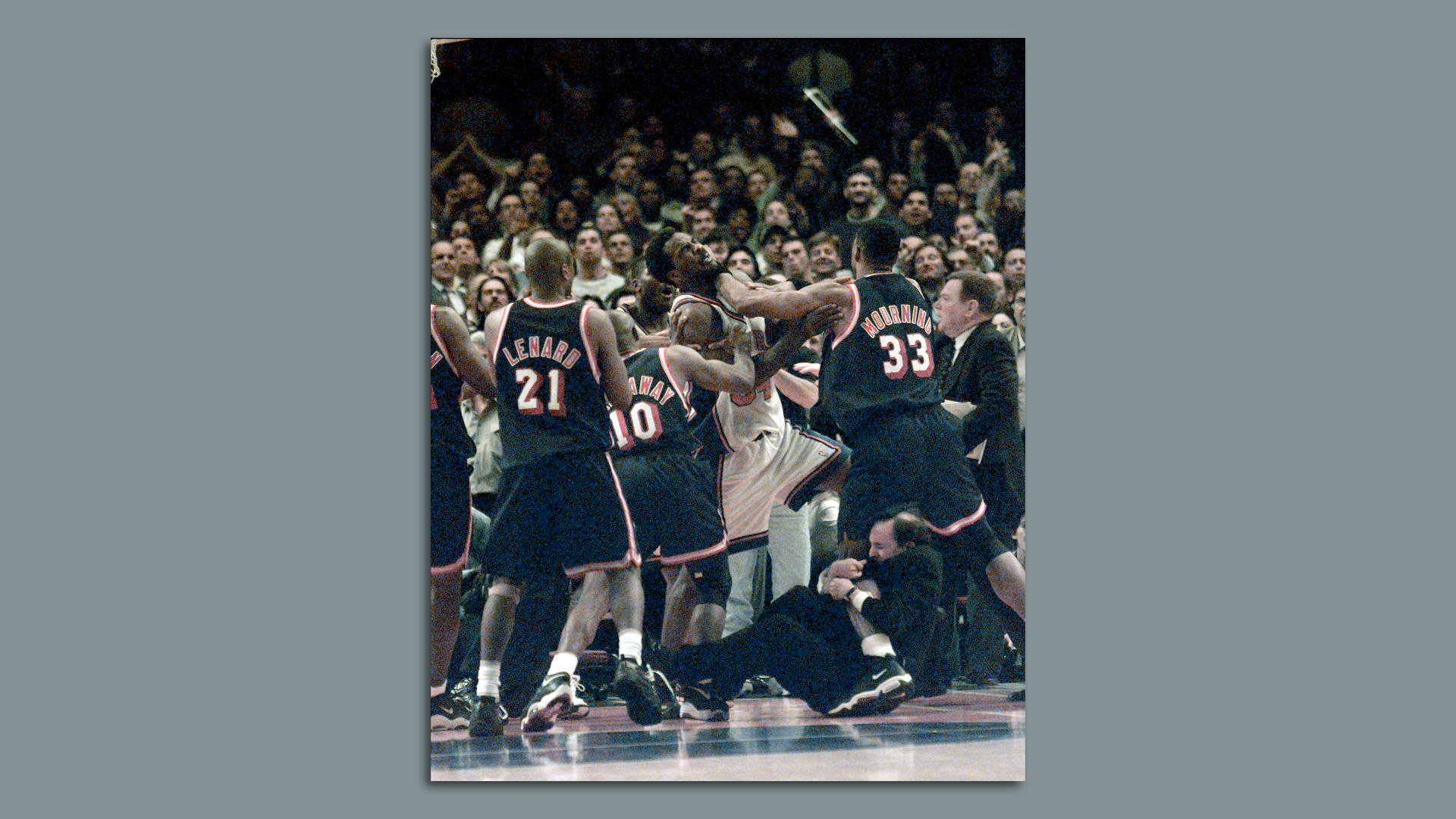 UNITED STATES - APRIL 30: New York Knicks vs. Miami Heat at MSG for Game4... Knicks Charles Oakley is shoved by Heats Alonzo Mourning while Jeff Van Gundy got a piece of Alonzo's leg trying to seperate players. 